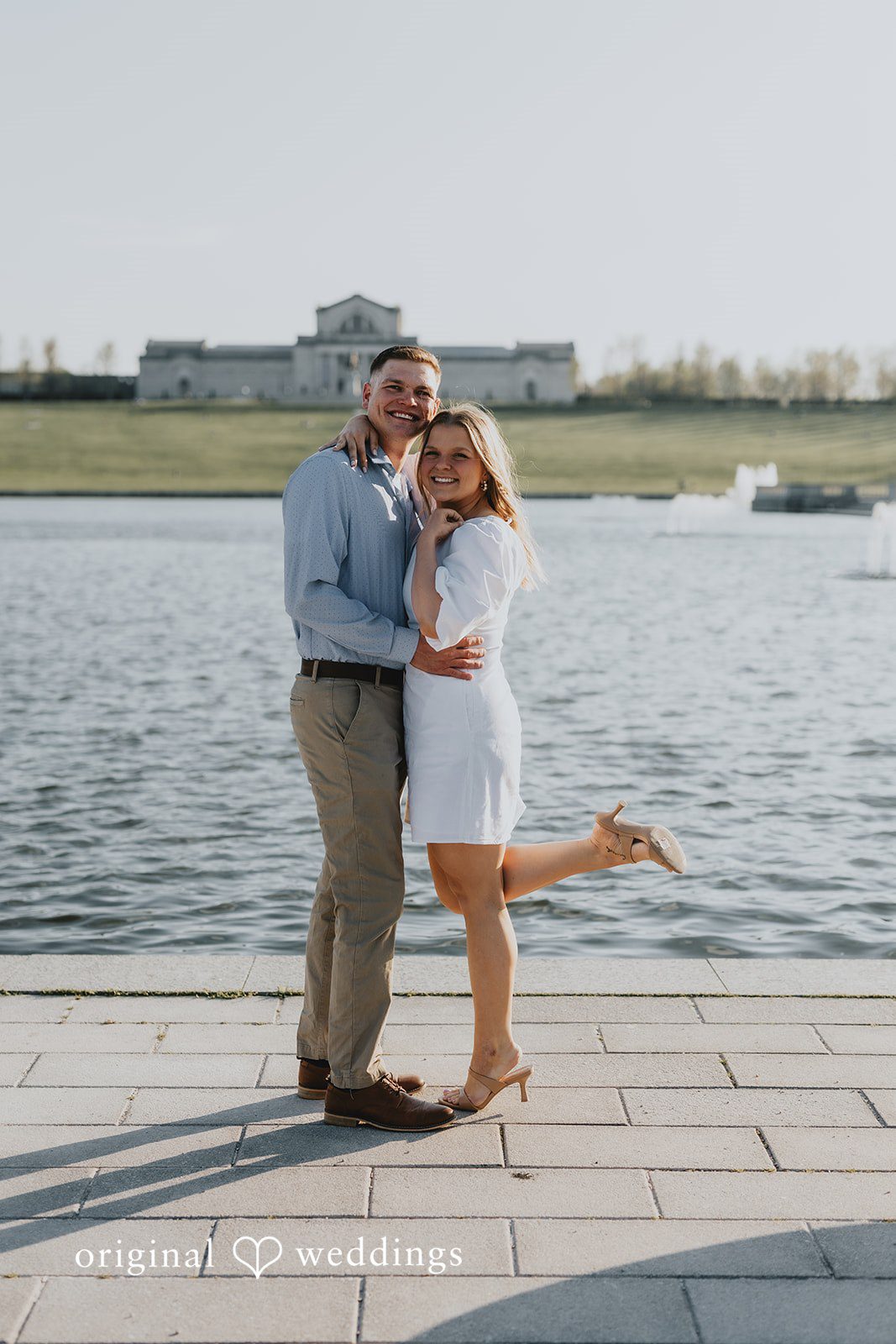 A stunning portrait of the couple by the waterfront