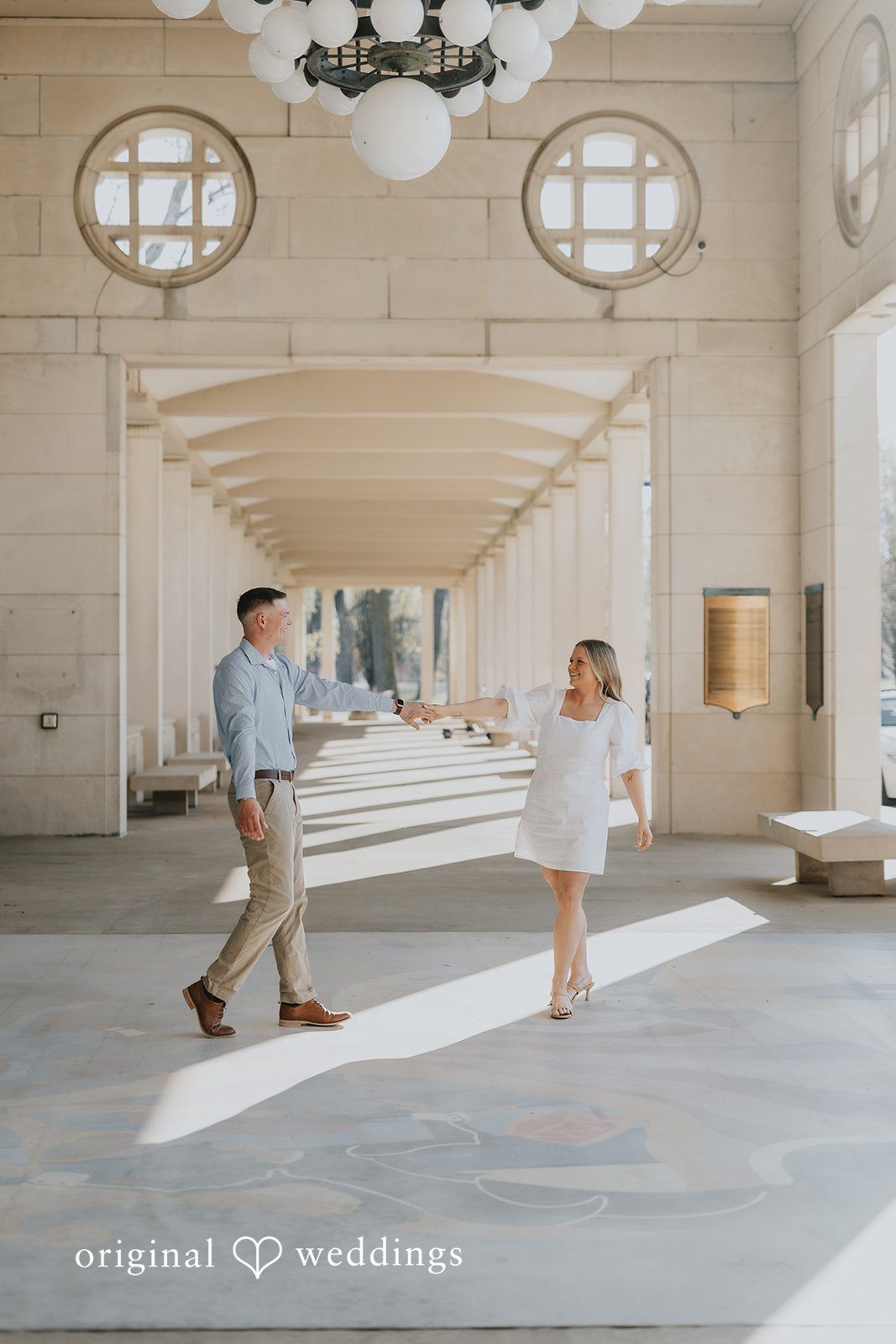 Our St. Louis wedding photographers captured a stylish portrait of the couple at the walkway
