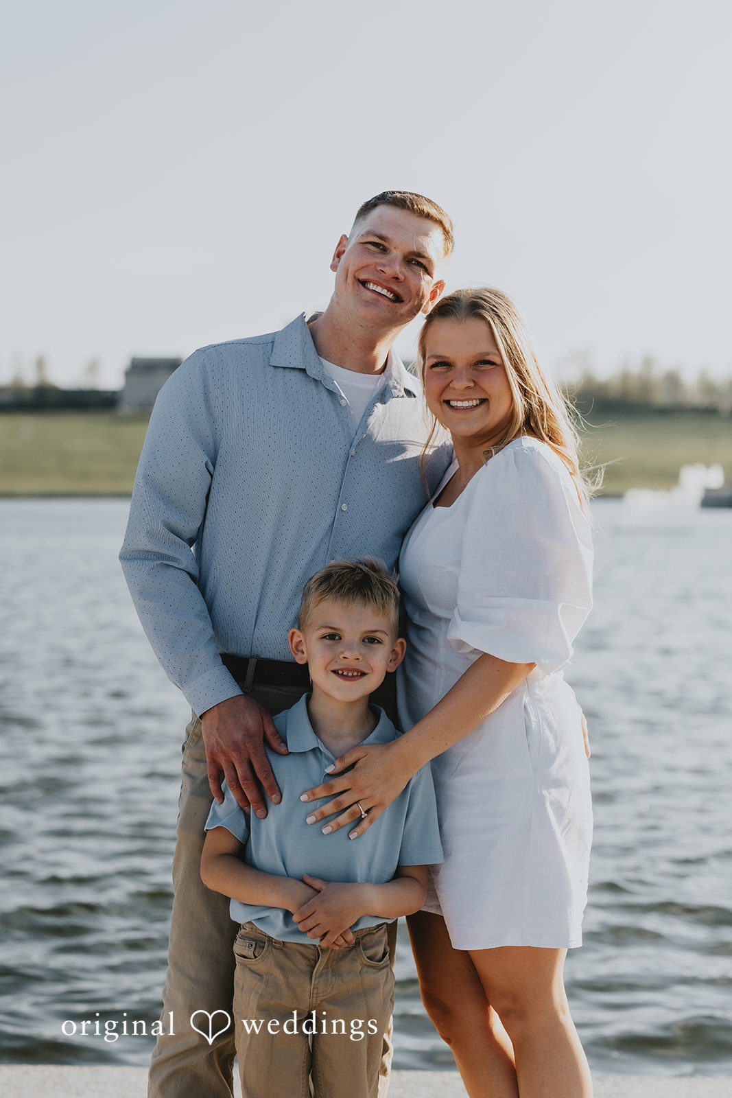 Our St. Louis wedding photographers captured a stunning portrait of the couple with their son