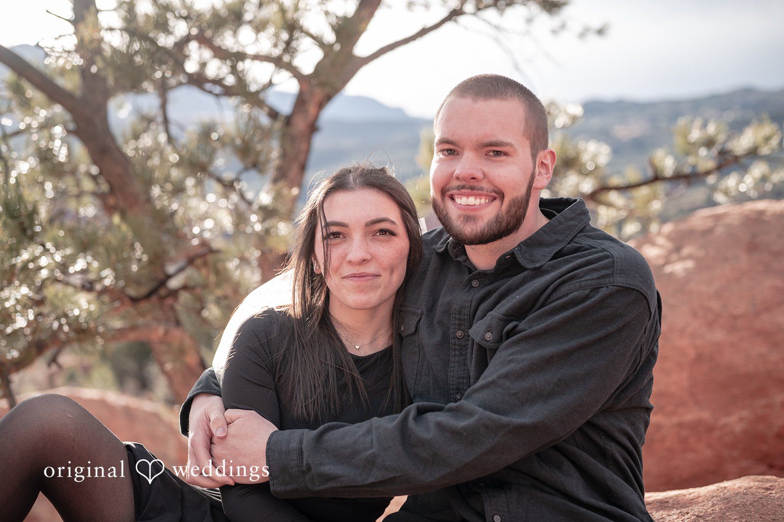 The couple shares a hug
