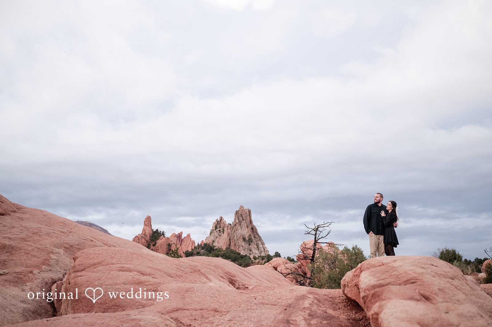 A unique portrait of the couple overlooking the rocks