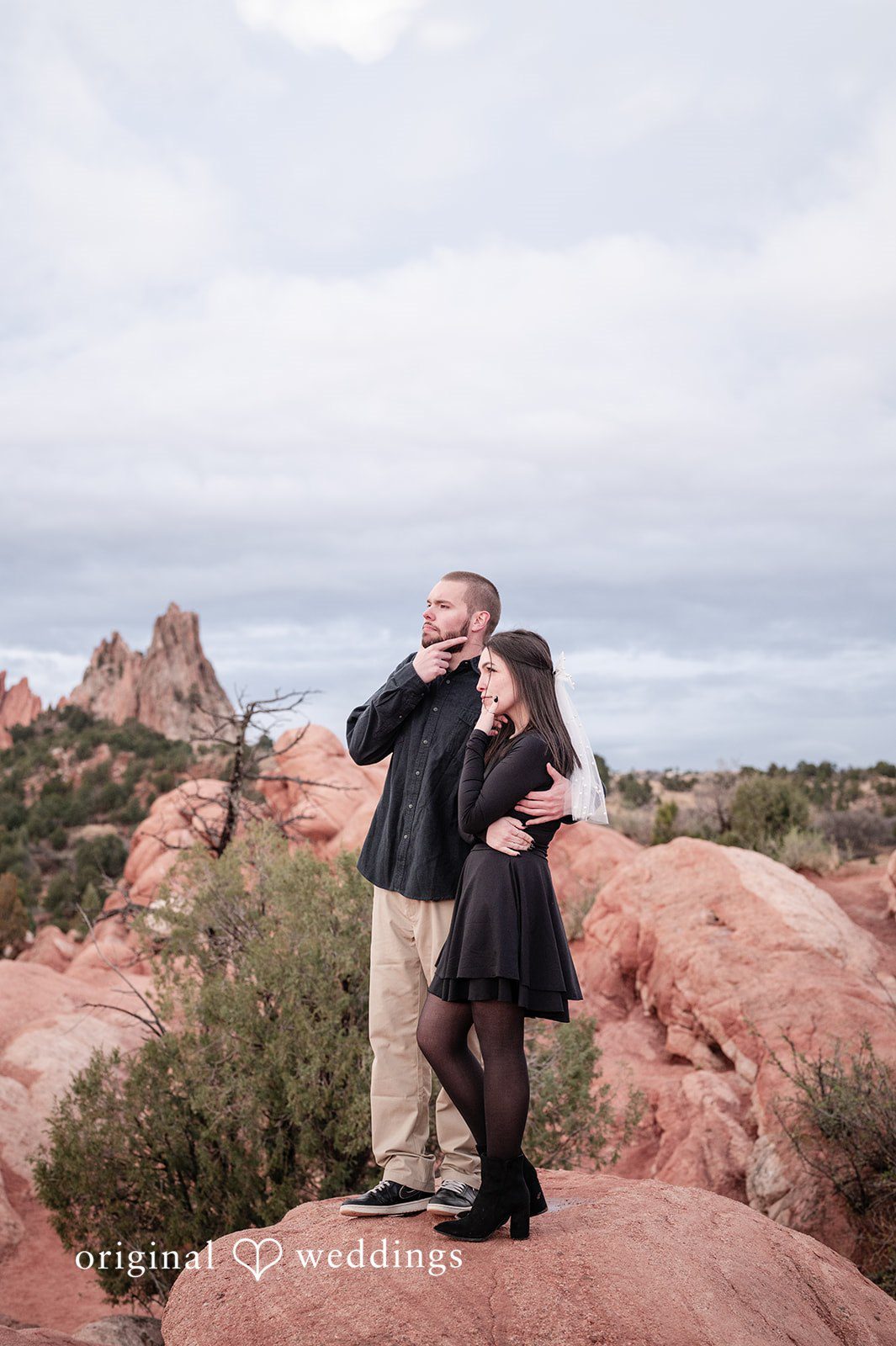 A portrait of the couple on the rocks