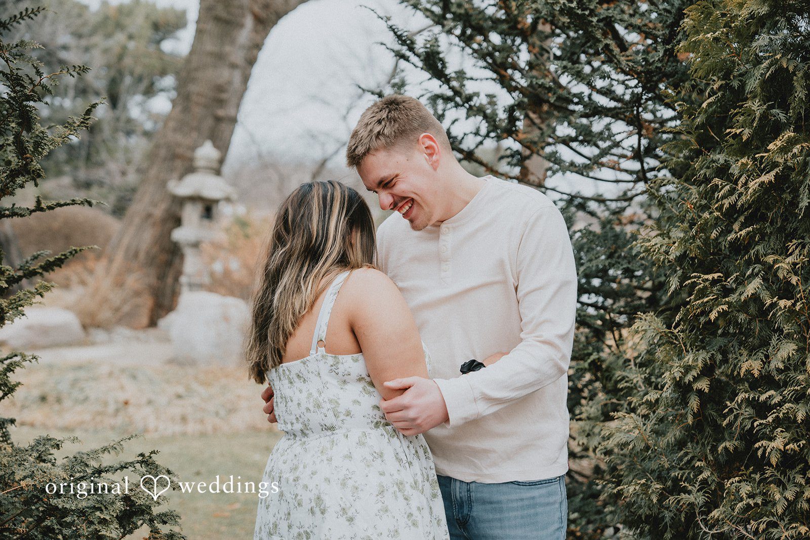 Couple smiling at each other.