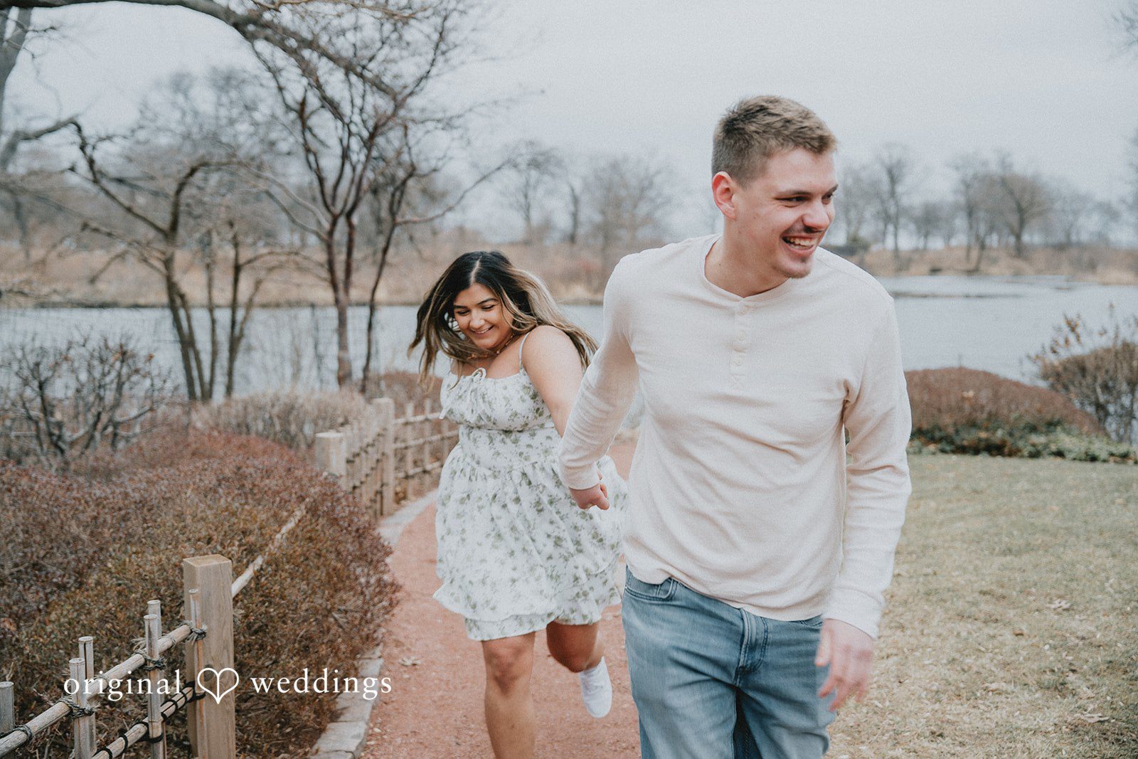 Couple expressing their joy at Garden of the Phoenix in Jackson Park.