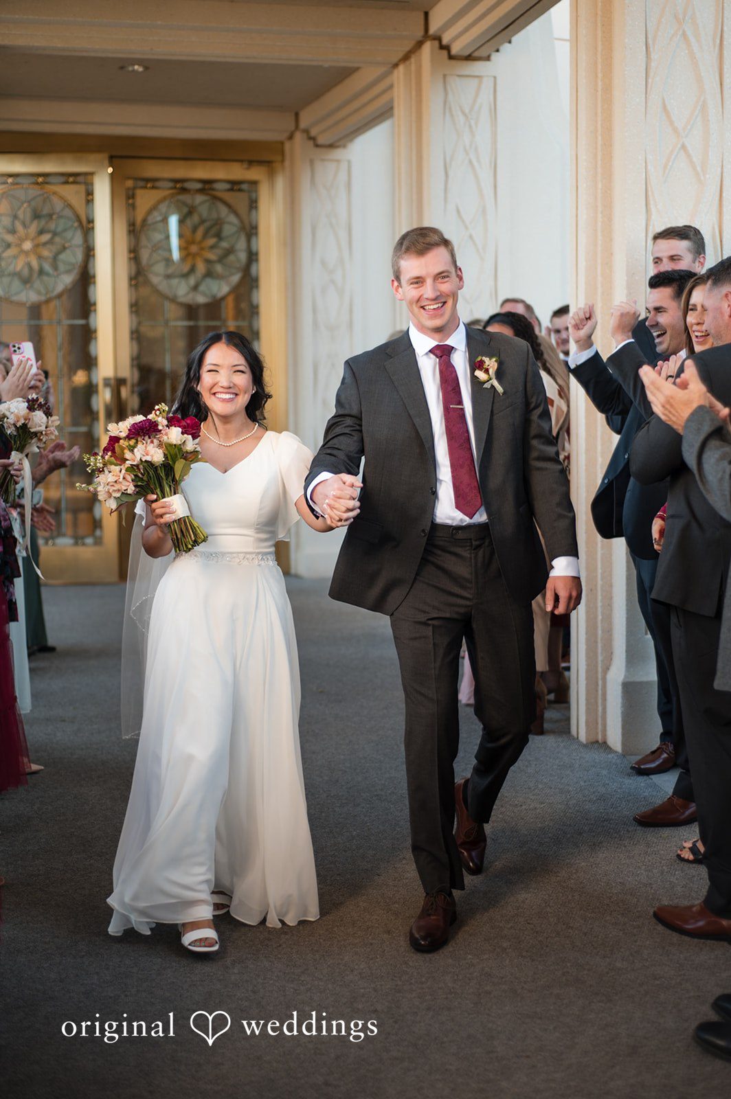 Bride and groom walking together toward the reception