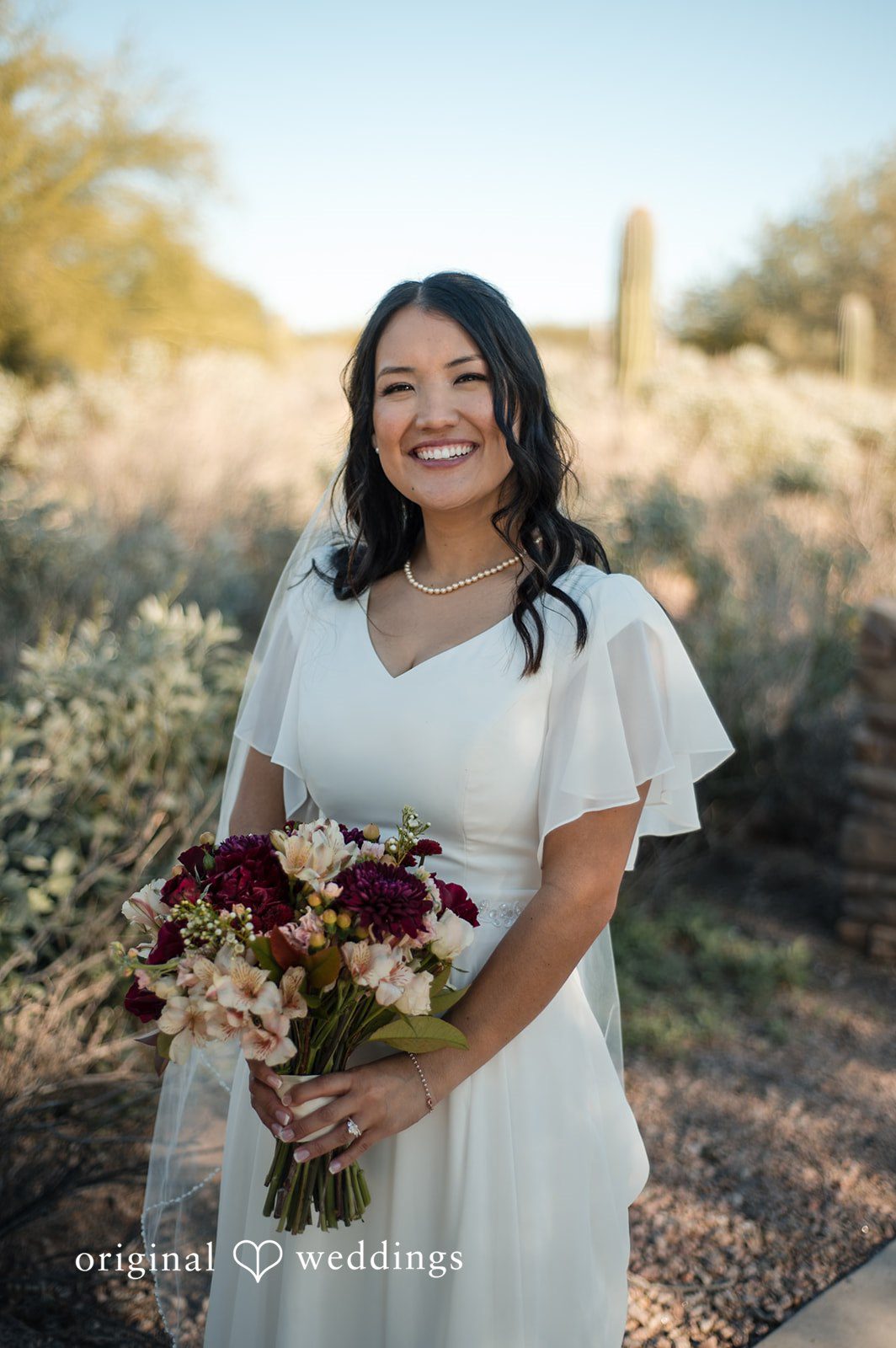Bridal portrait captured outdoors before the ceremony