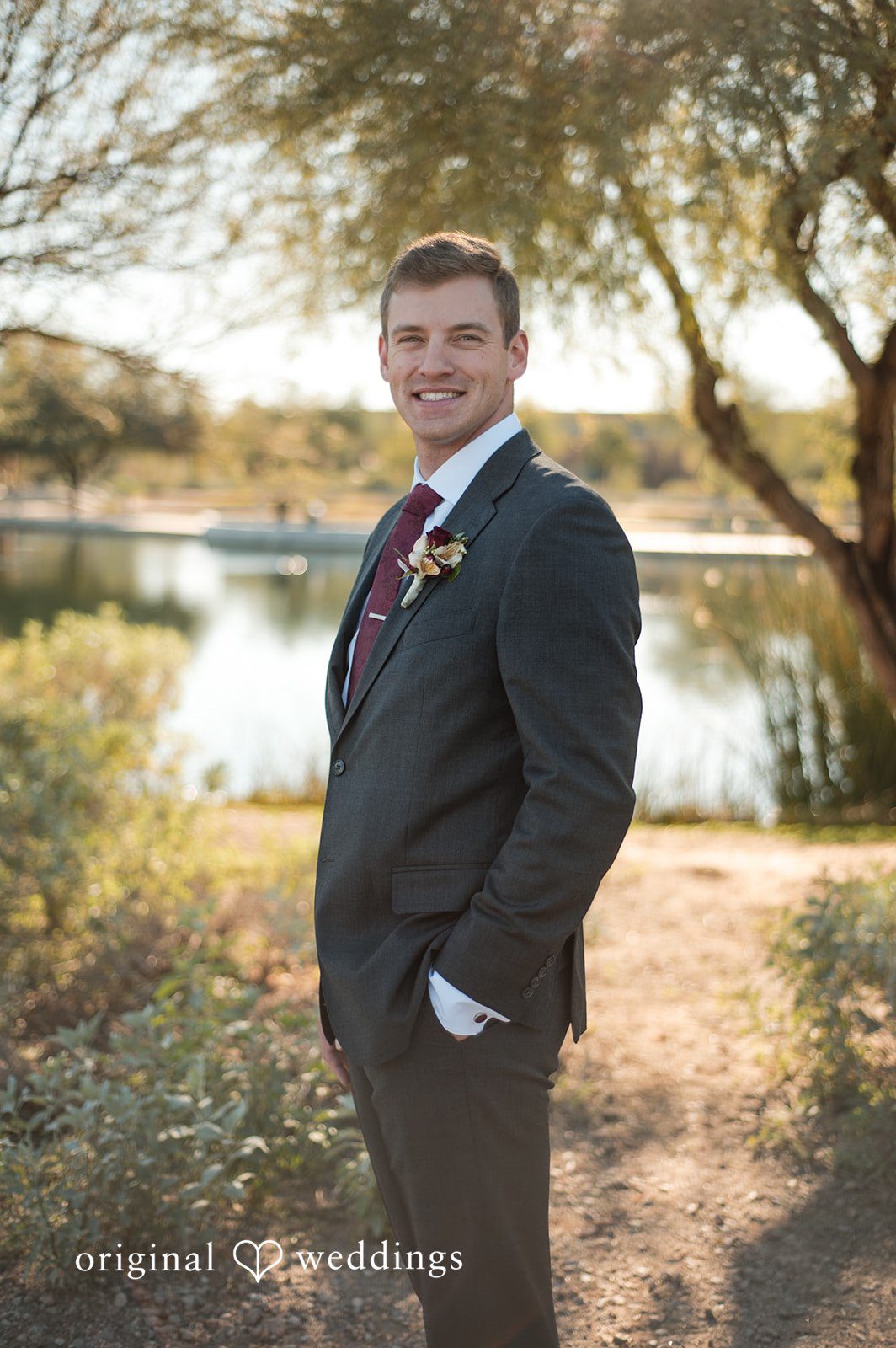 Groom portrait outdoors before the ceremony begins