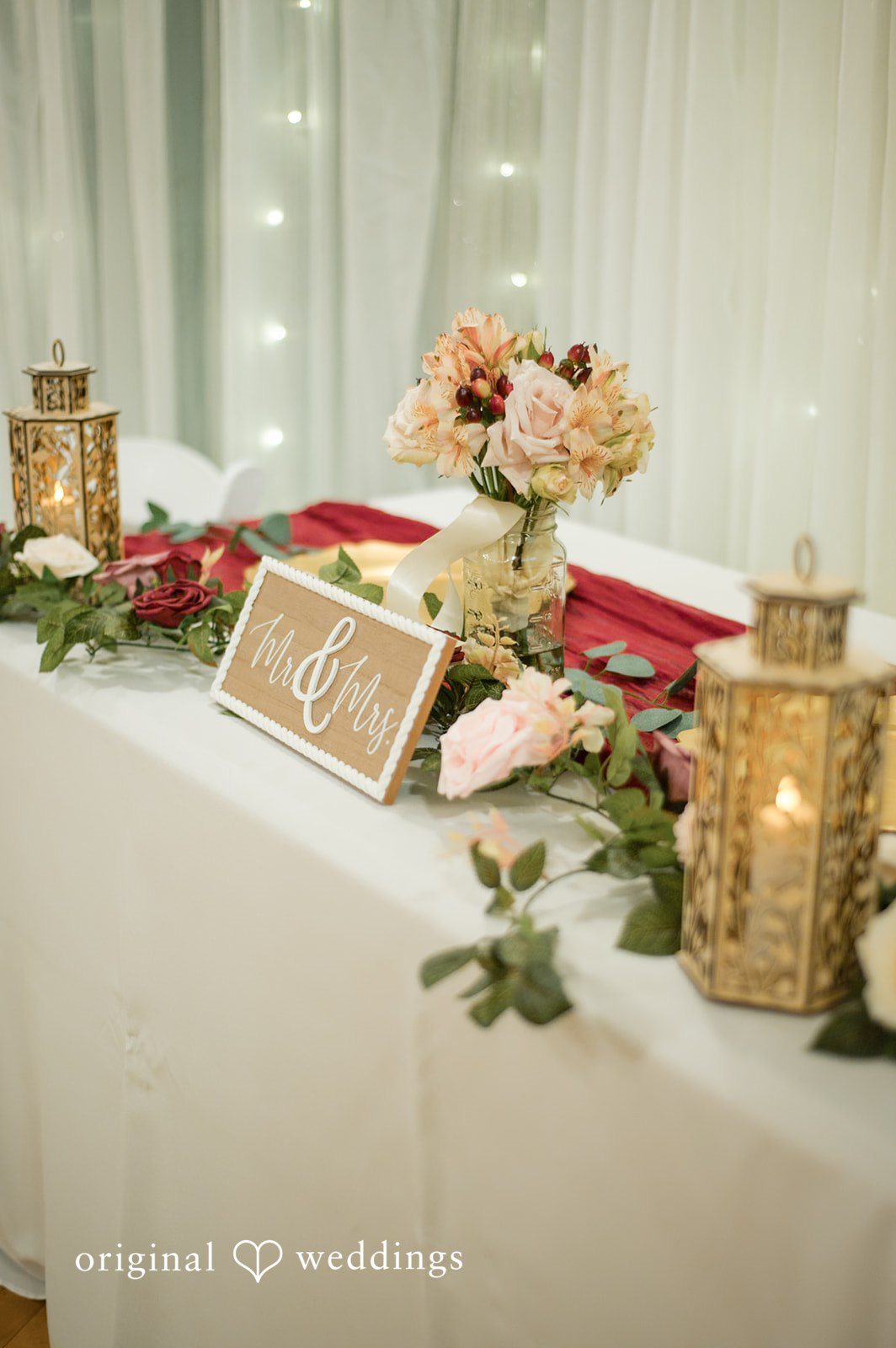 Decorated sweetheart table prepared for the wedding reception