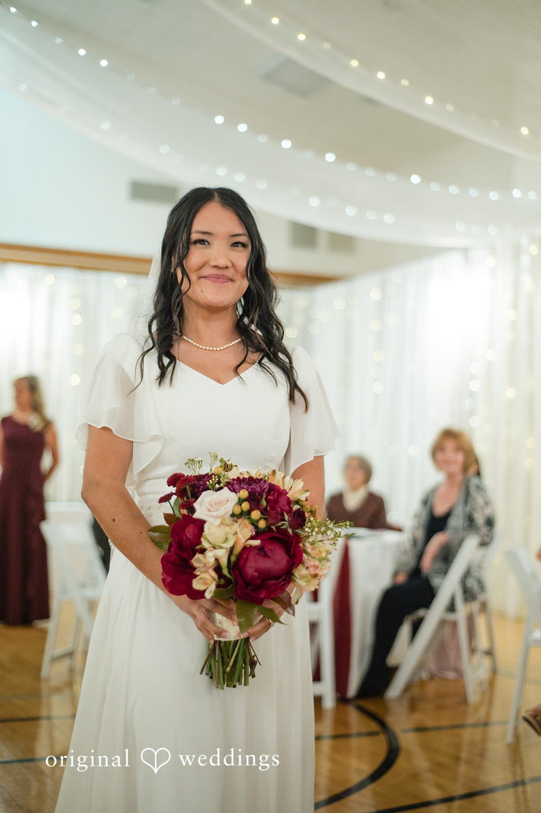 Bride posing alone during the wedding reception