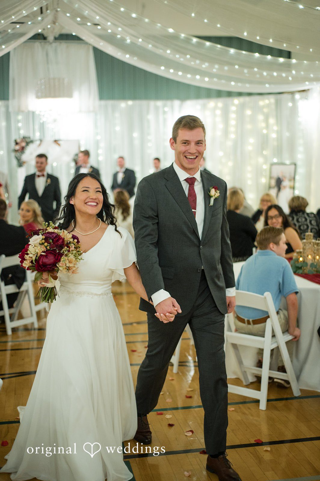 Close-up portrait of the couple walking together after the ceremony