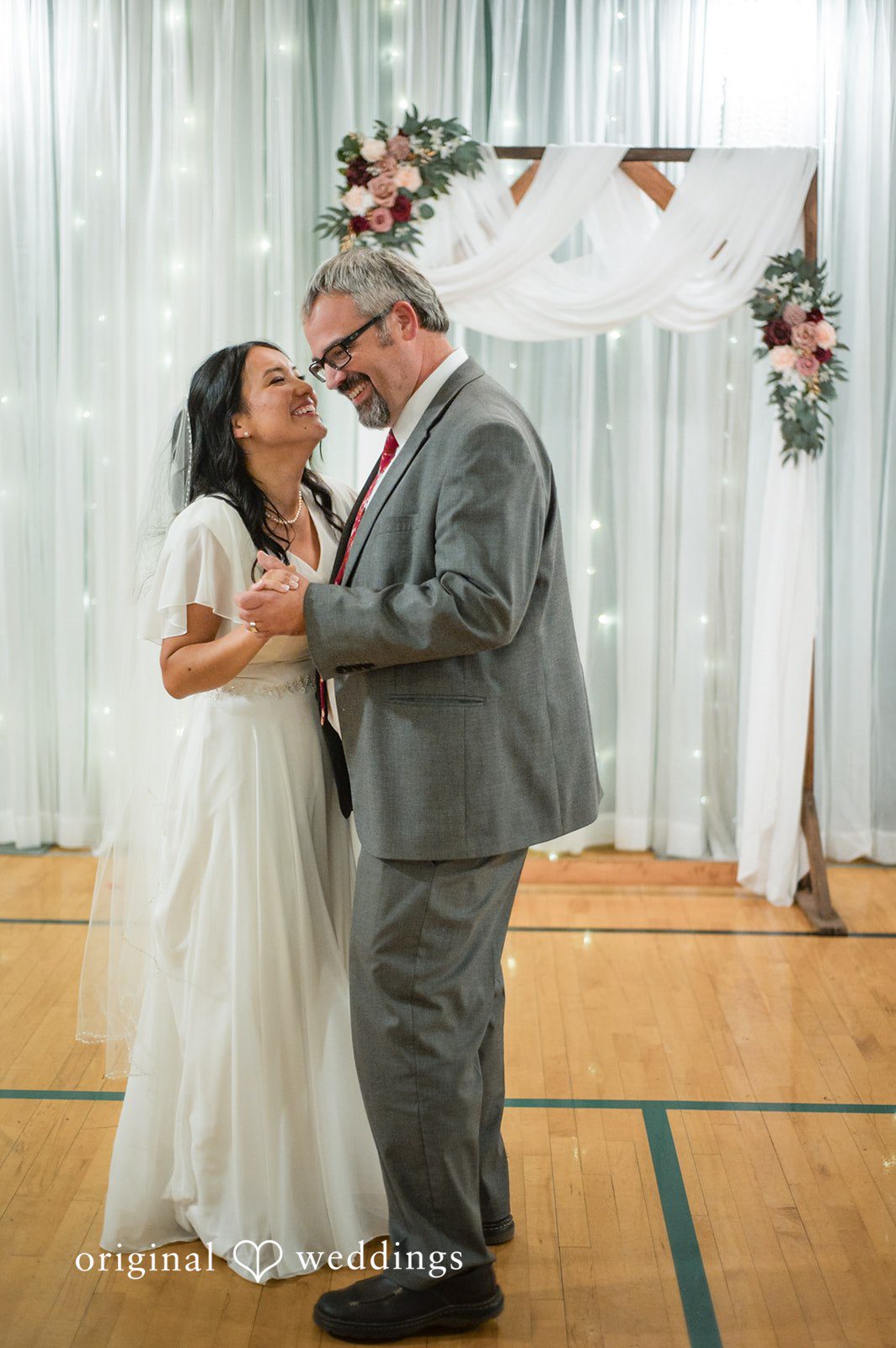 Bride dancing with her father during the reception