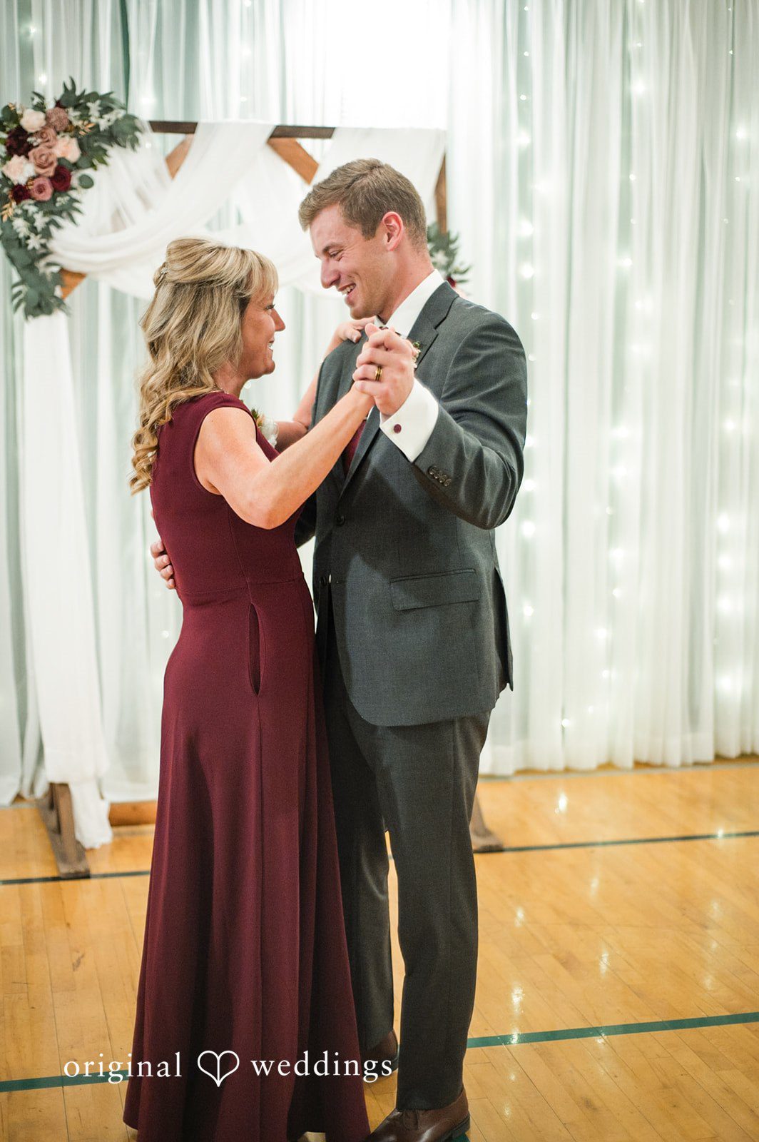 Groom dancing with his mother during the wedding celebration