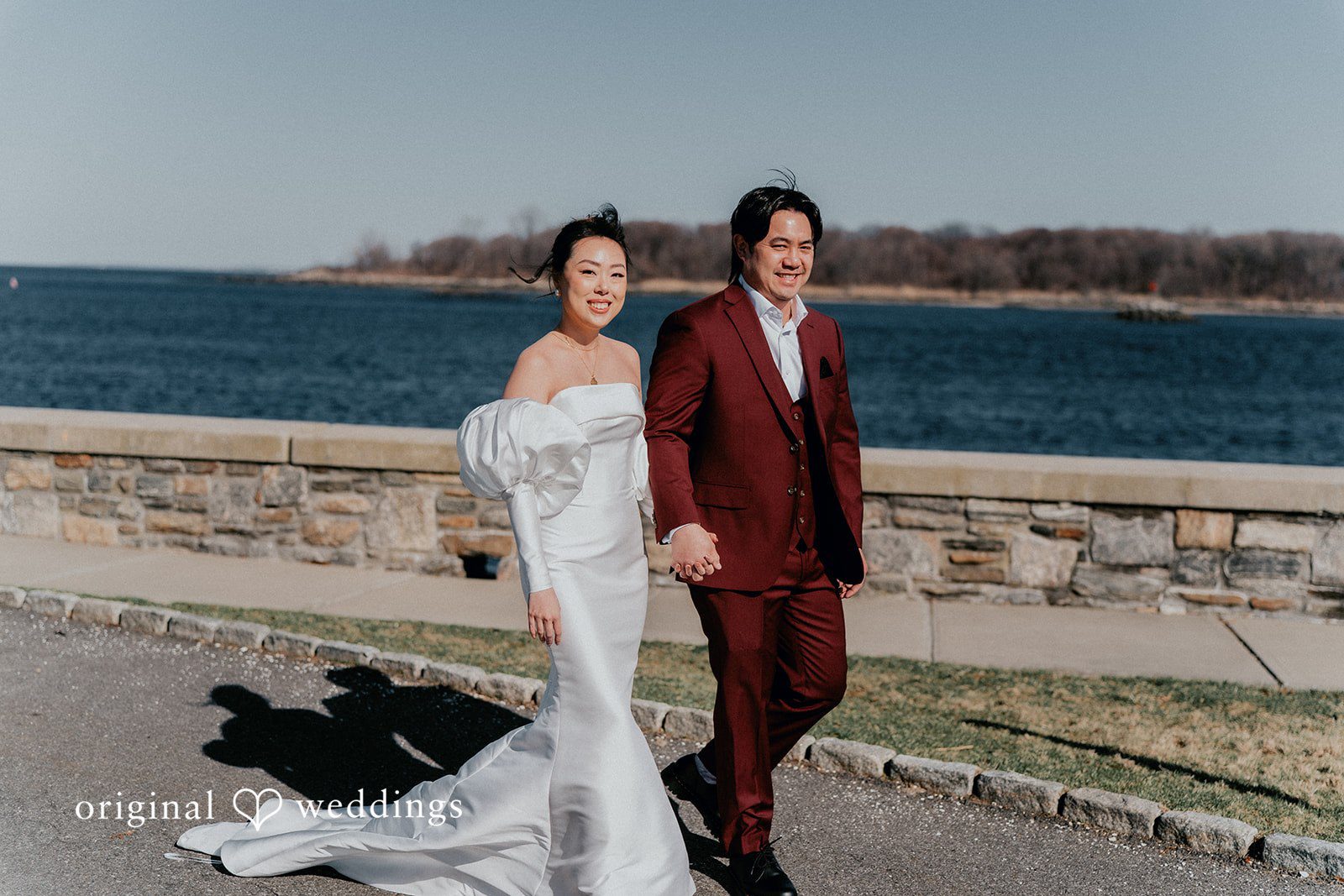 Our New York City wedding photographers captured a stunning portrait of the groom along the water edge at Glen Island Harbour Club