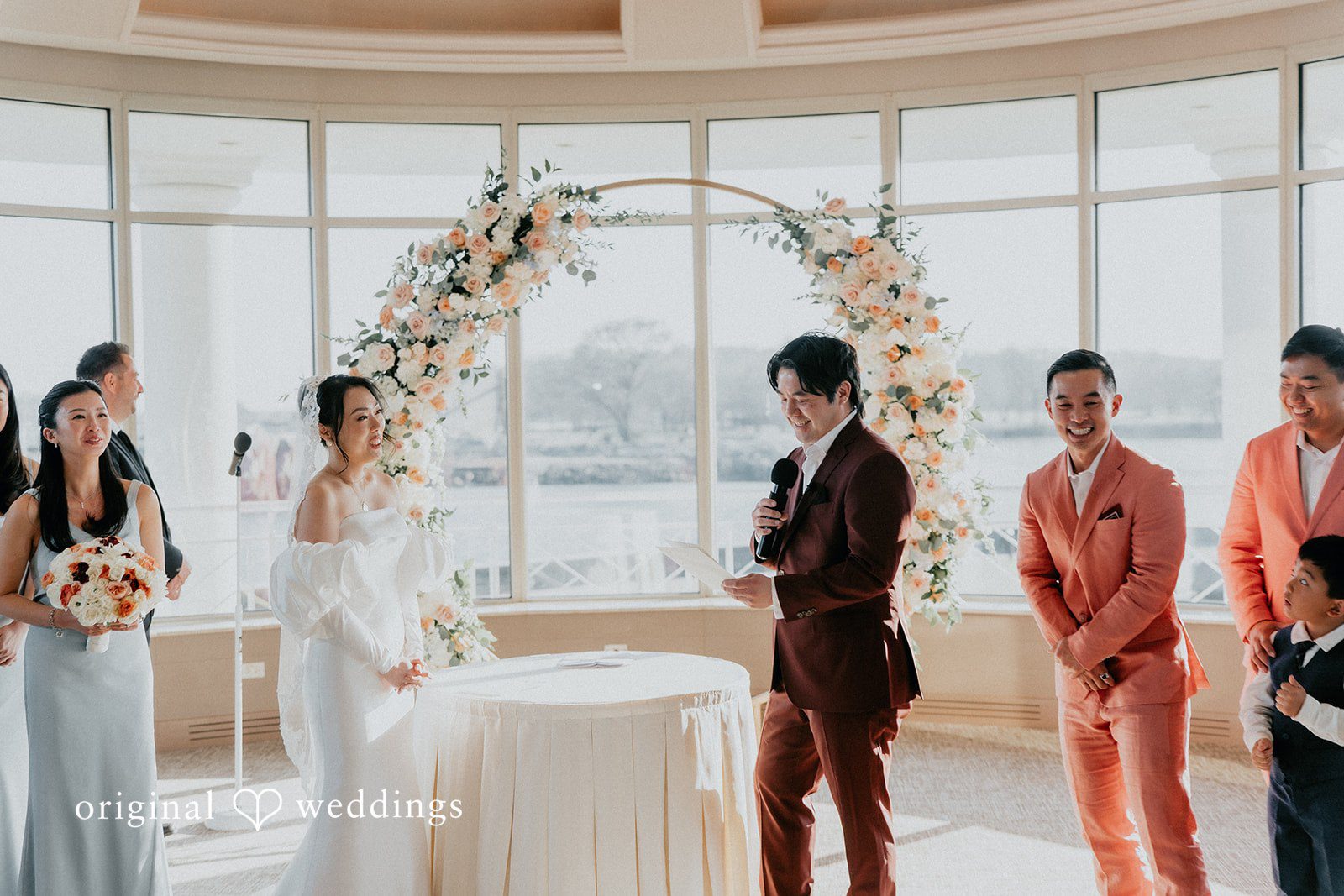 The groom reads his vows to the bride