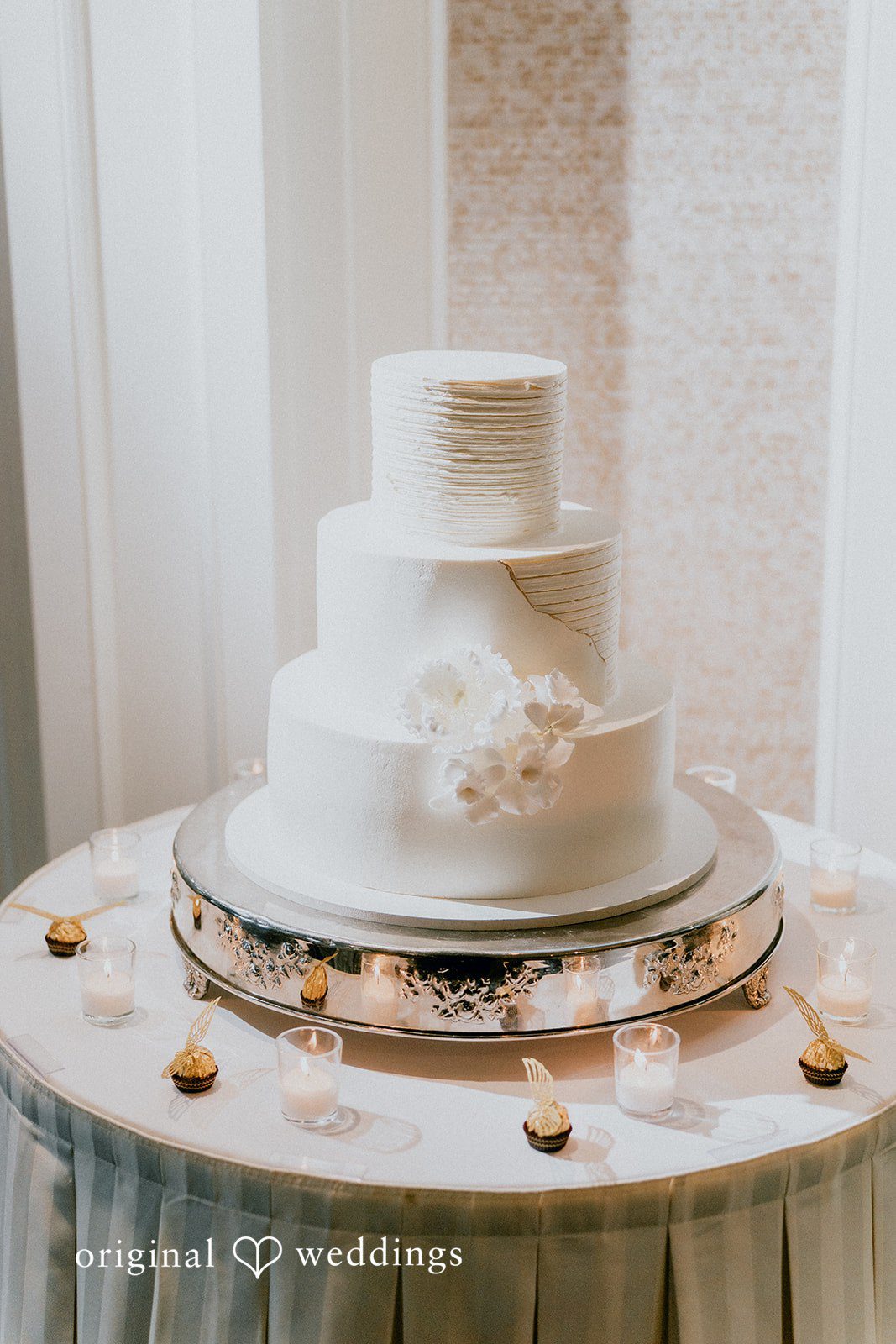 An all-white wedding cake