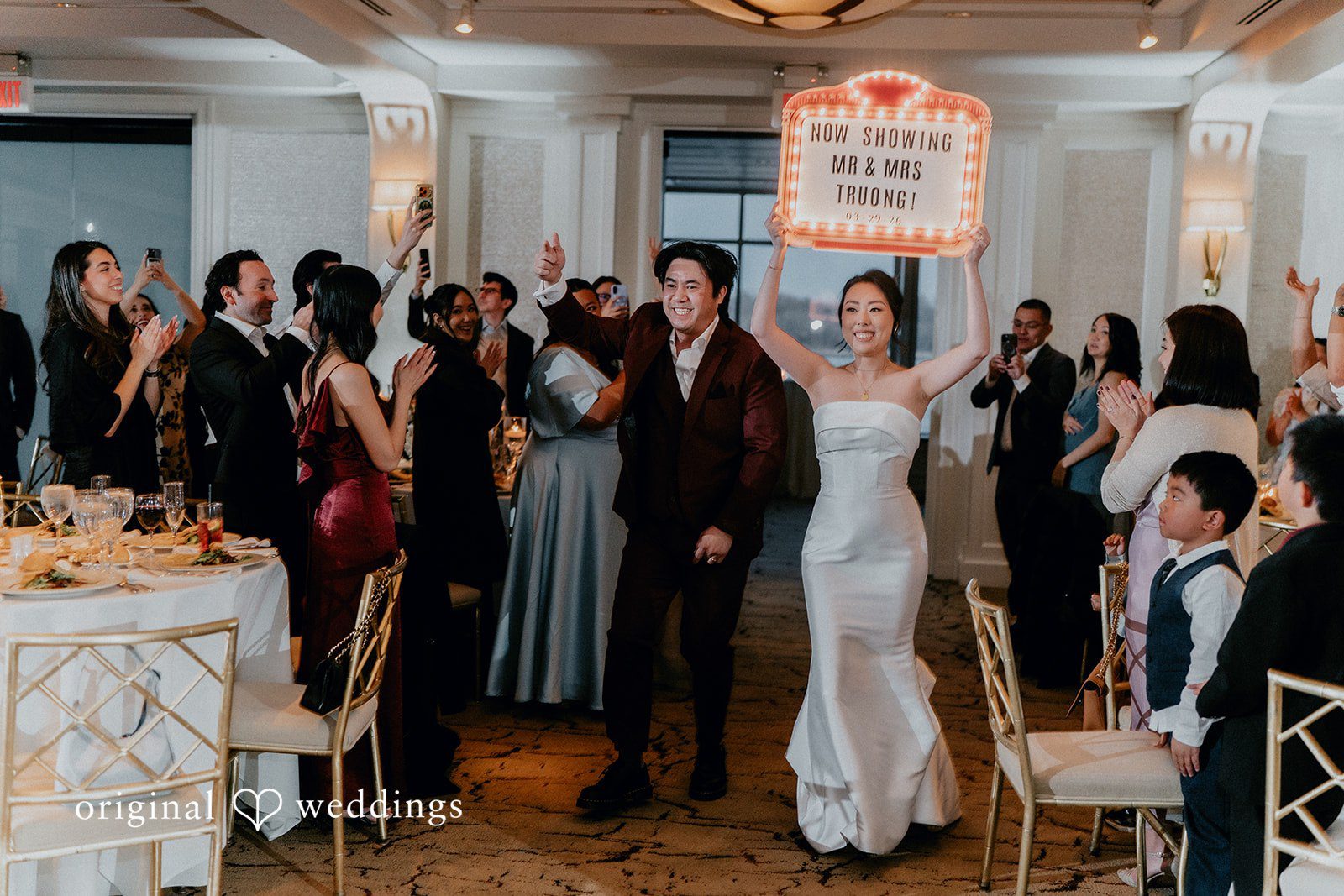 The couple makes a grand entrance to their wedding reception