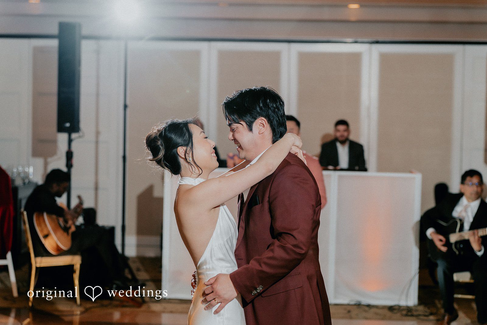 The couple takes their first dance
