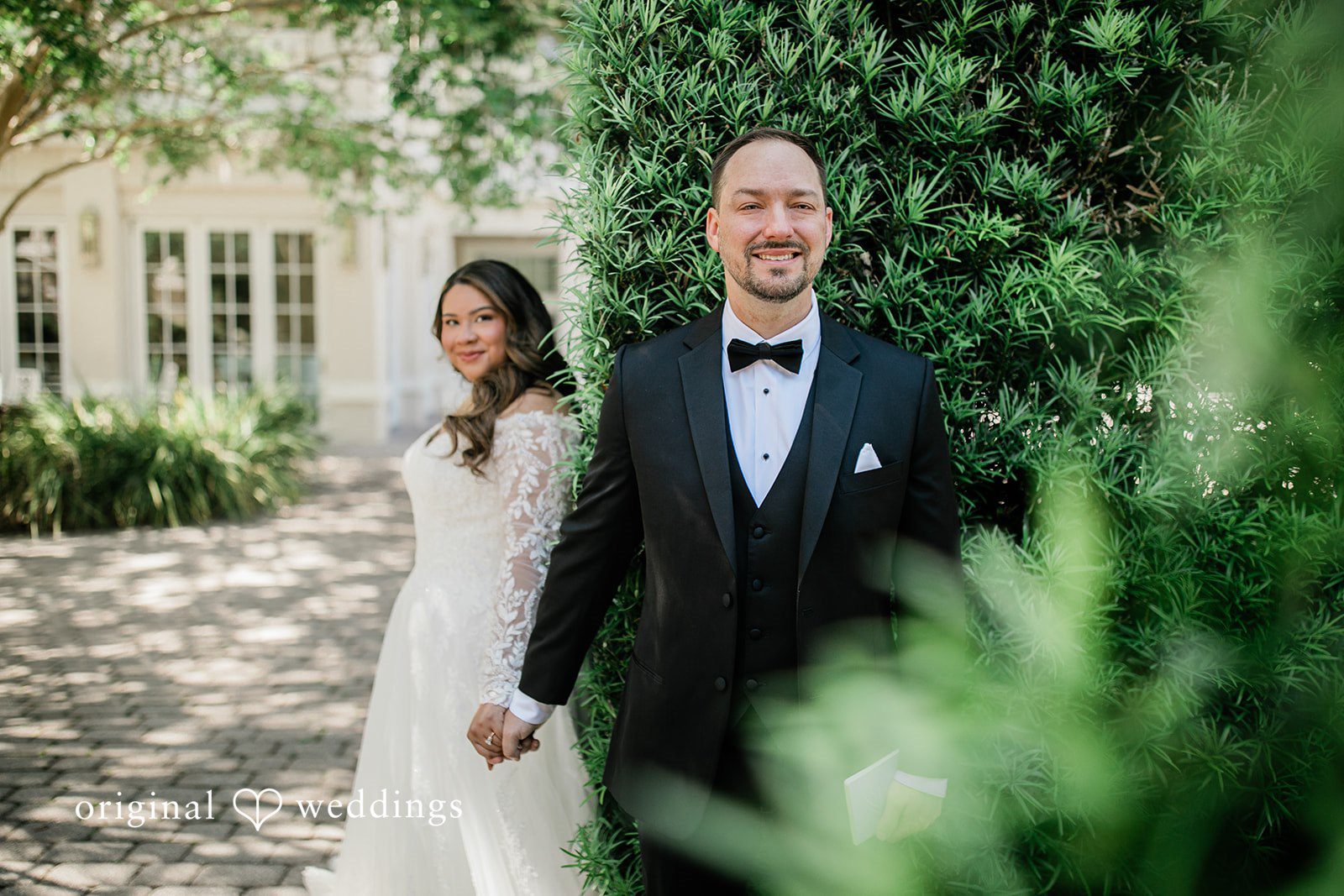 A stunning portrait of the couple framed by the beauty of the wedding venue