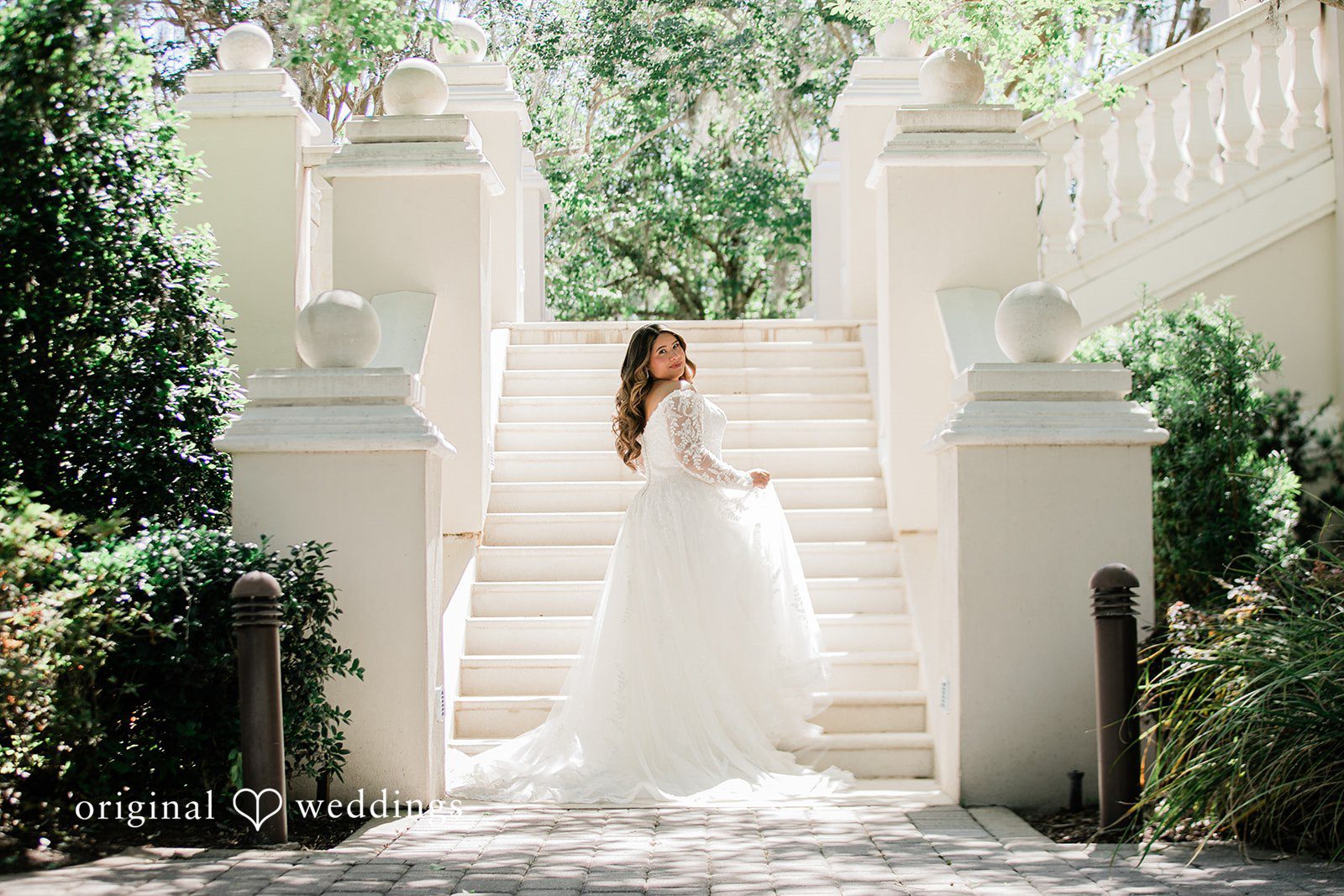Our Orlando wedding photographers captured a stunning portrait of the bride by the stairs at Golden Ocala Golf & Equestrian Club
