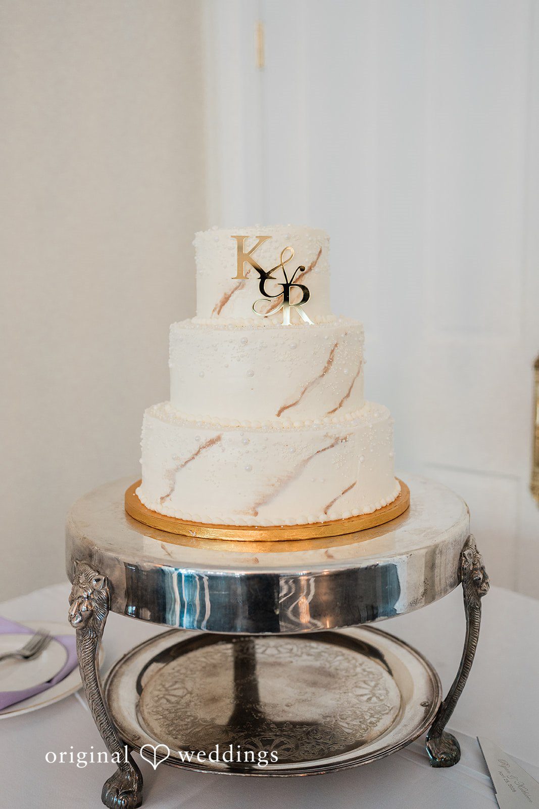 An all-white wedding cake