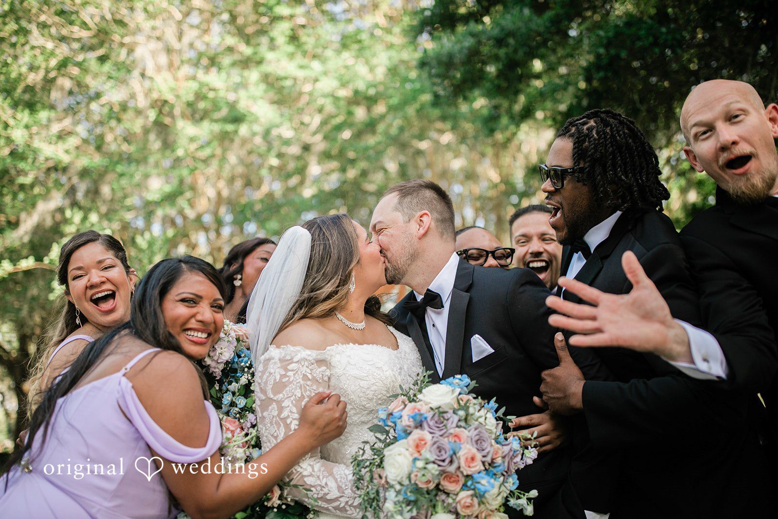 The couple shares a romantic kiss