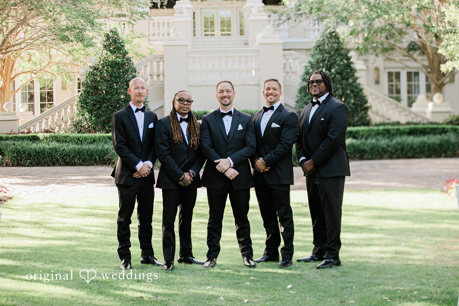 A portrait of the groom and his groomsmen
