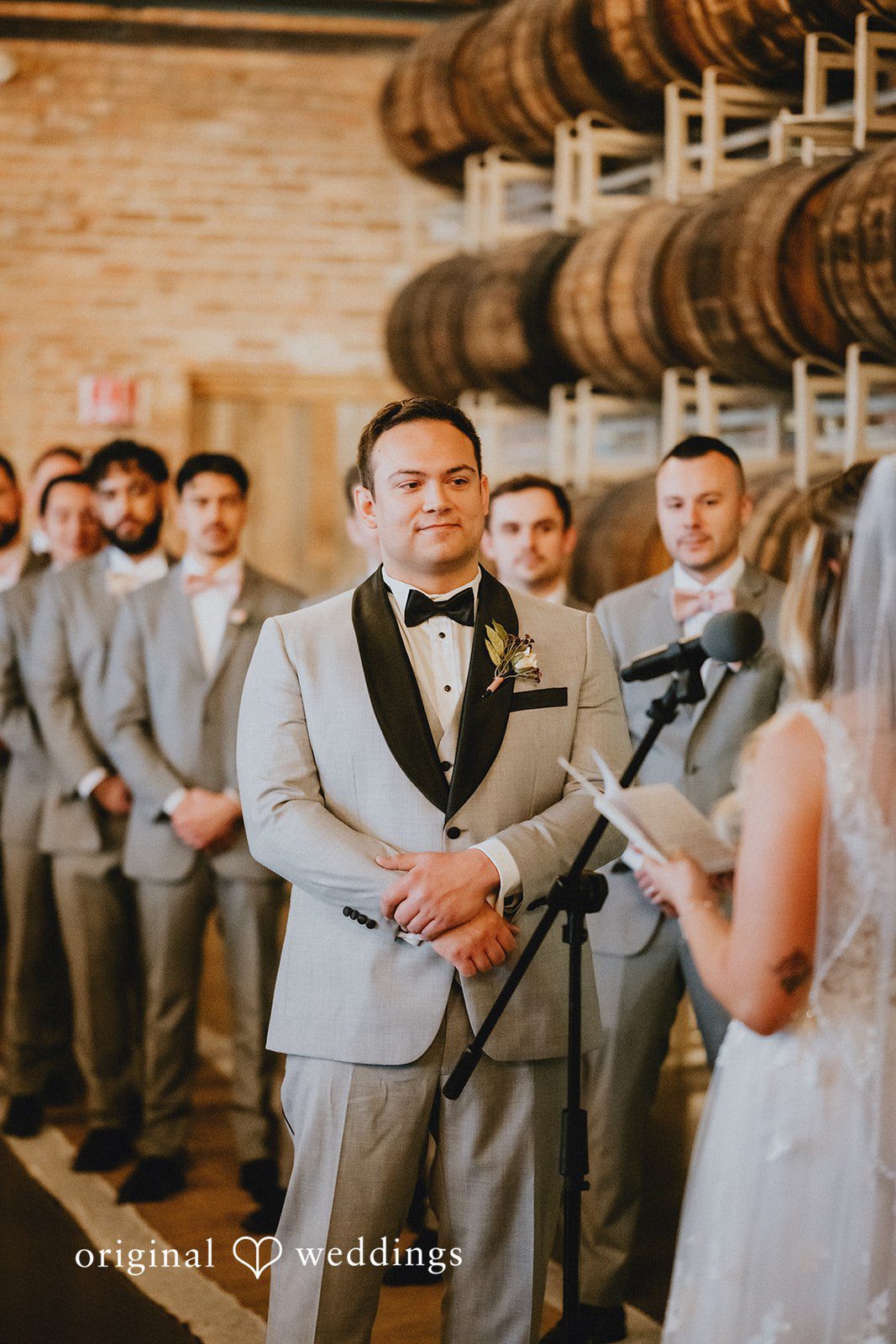 The bride reads her vows to the groom