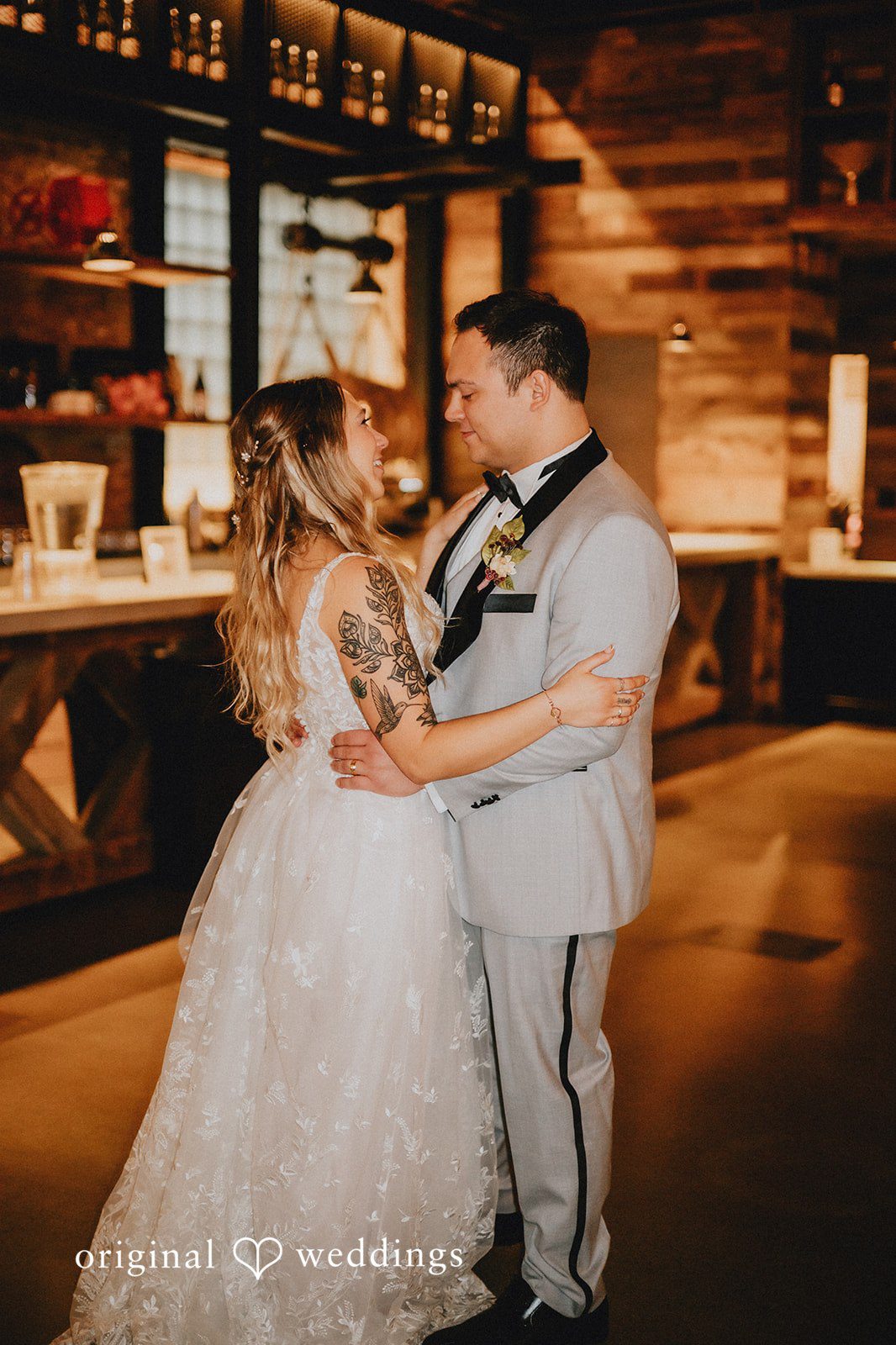 The couple takes their first dance