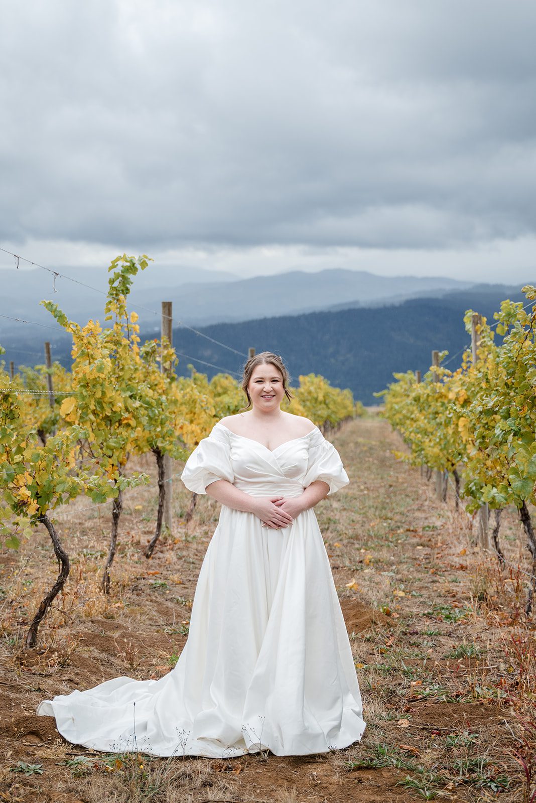 Tiare + Jeremy Romantic bridal portrait with mountain views at Gorge Crest Vineyards