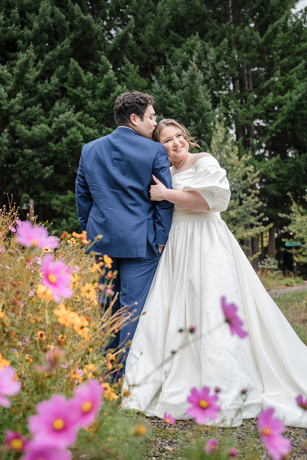 Tiare + Jeremy Groom kissing the bride on the forehead