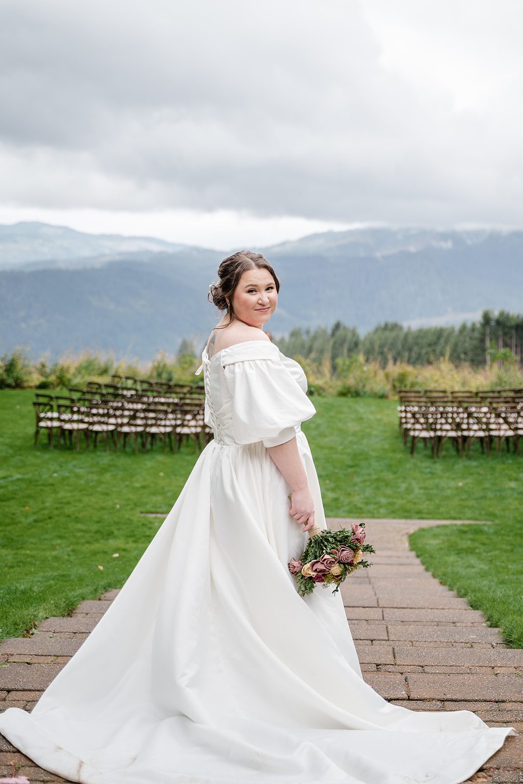Tiare + Jeremy Elegant bride portrait with scenic mountain backdrop