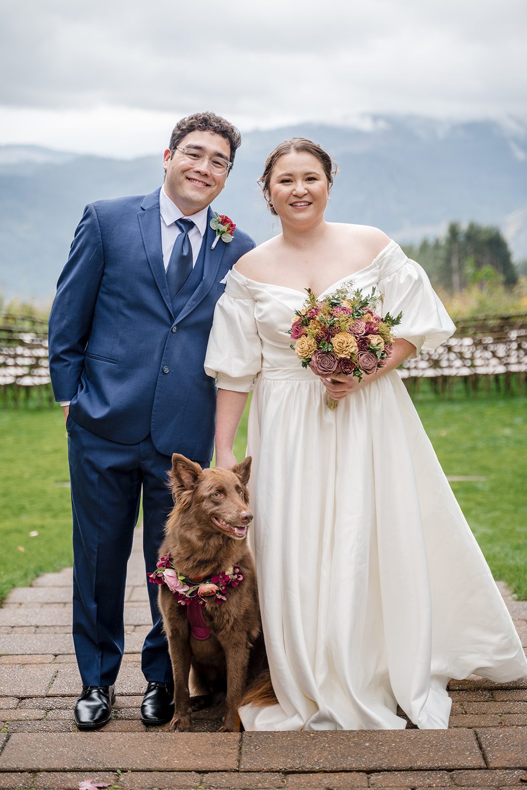 Tiare + Jeremy Bride and groom posing with their dog at Gorge Crest Vineyards