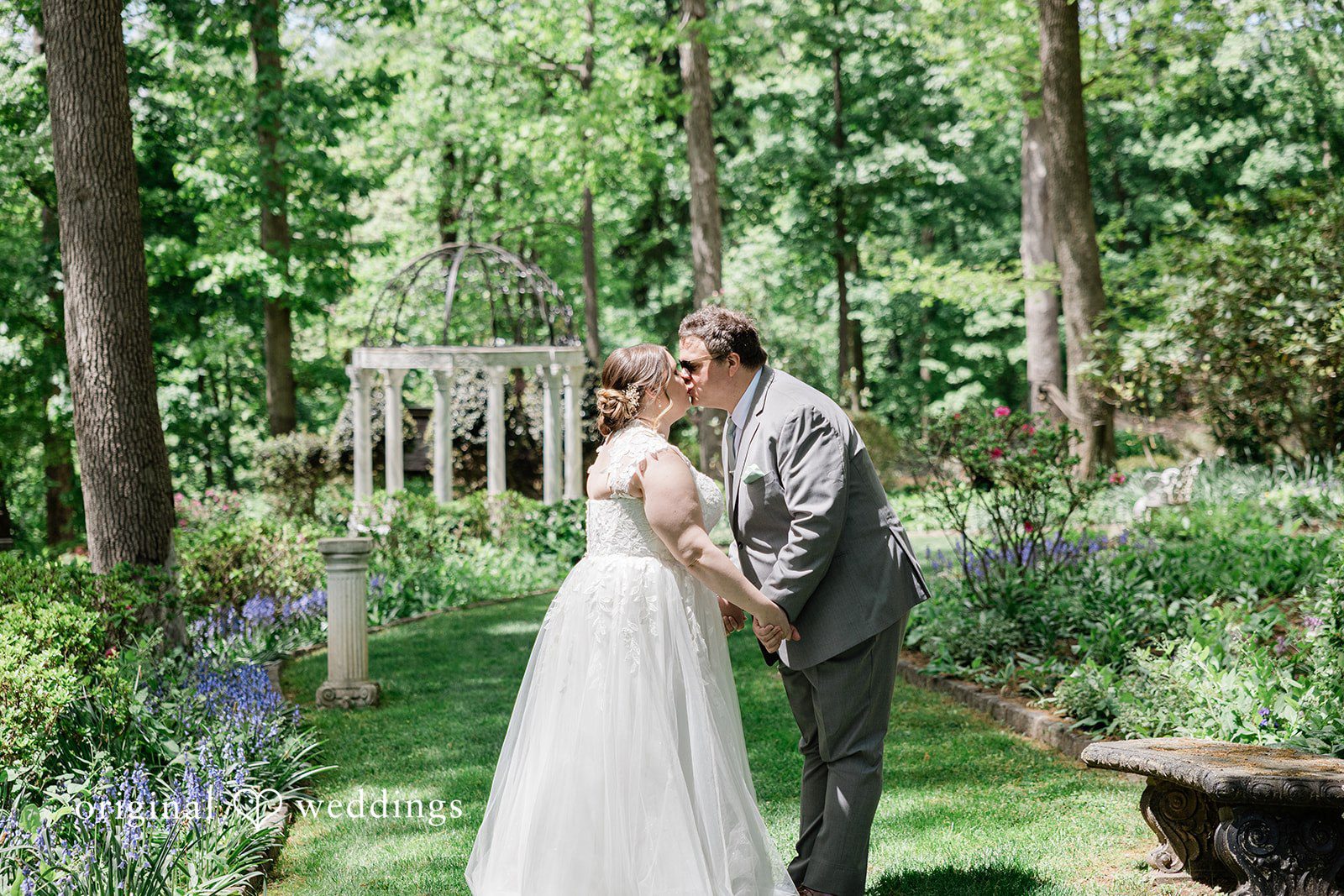 Nicole + Greg The couple shares a romantic kiss