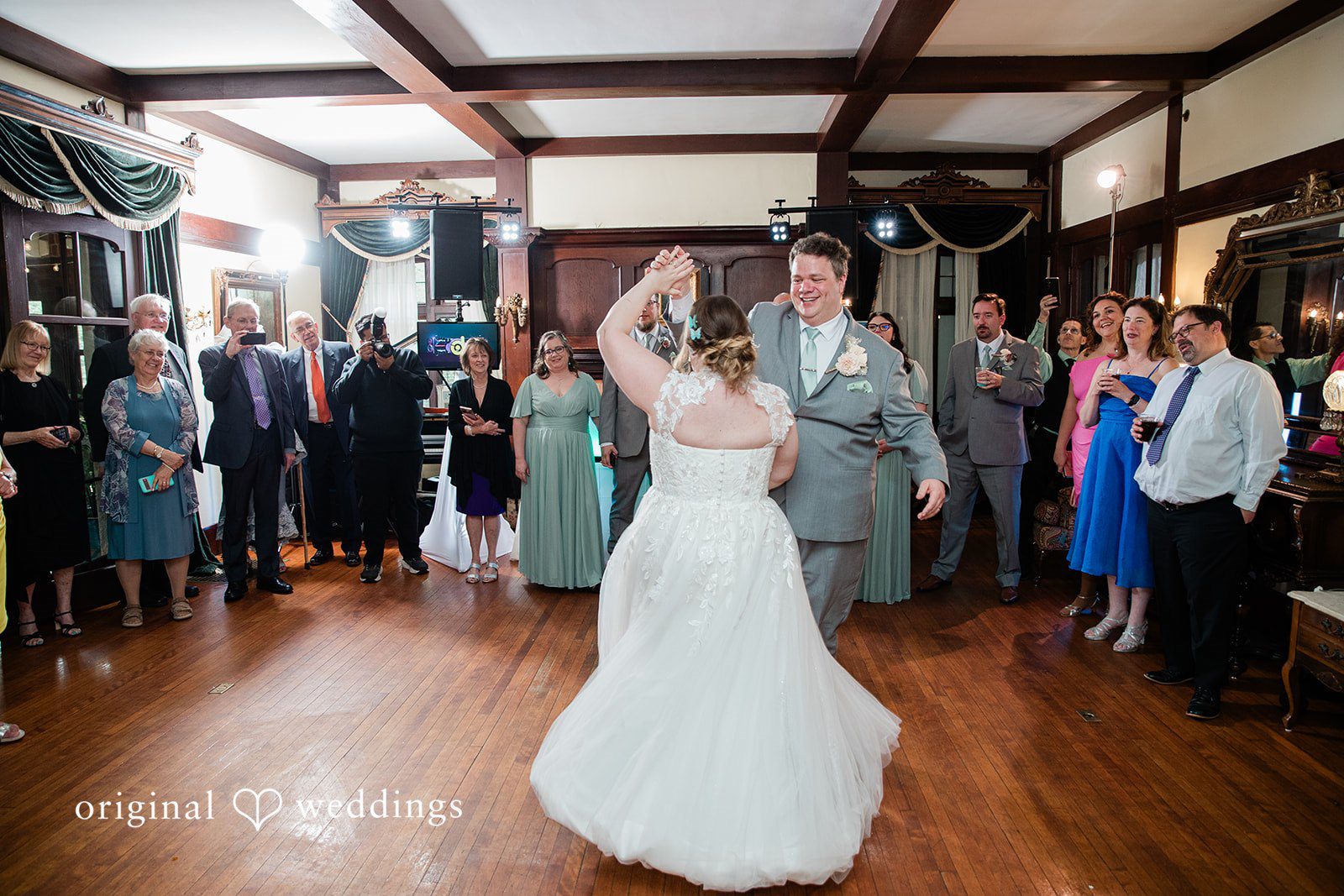 Nicole + Greg The couple dances at their wedding reception