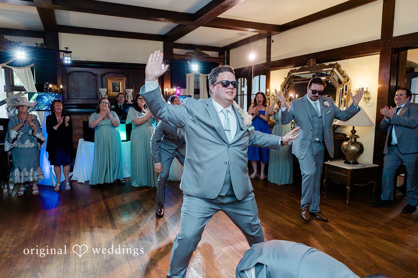 Nicole + Greg The groom dances happily
