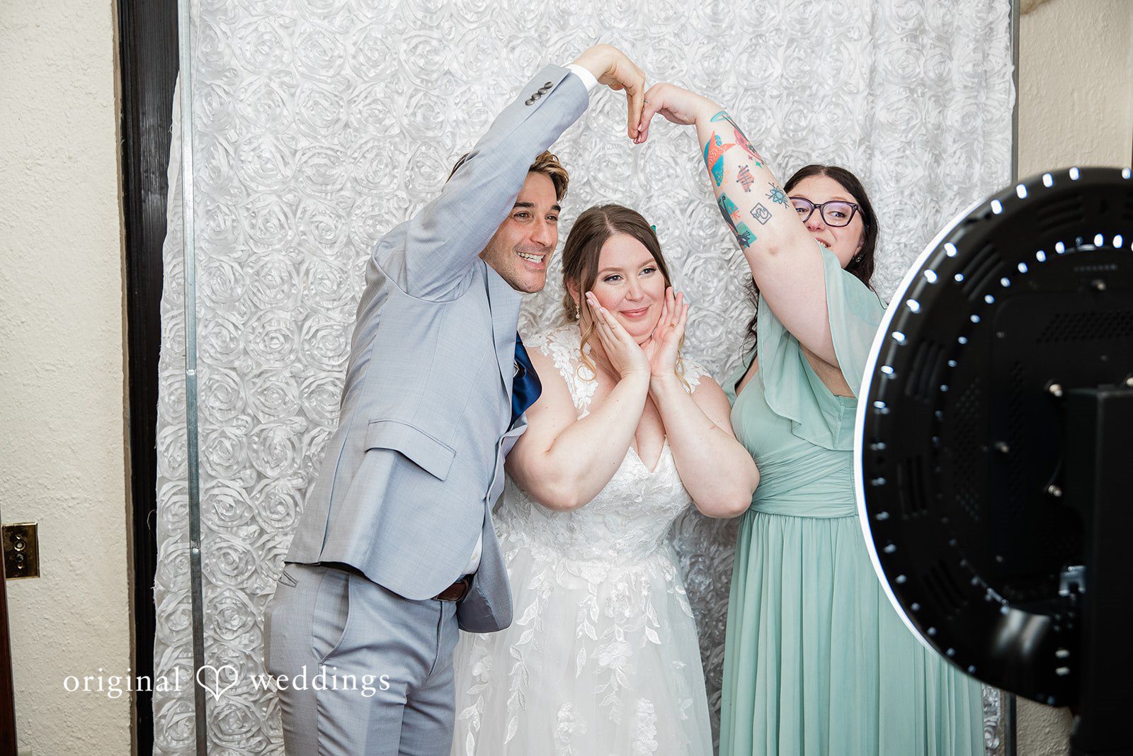 Nicole + Greg A stylish portrait of the bride and two of the bridal party
