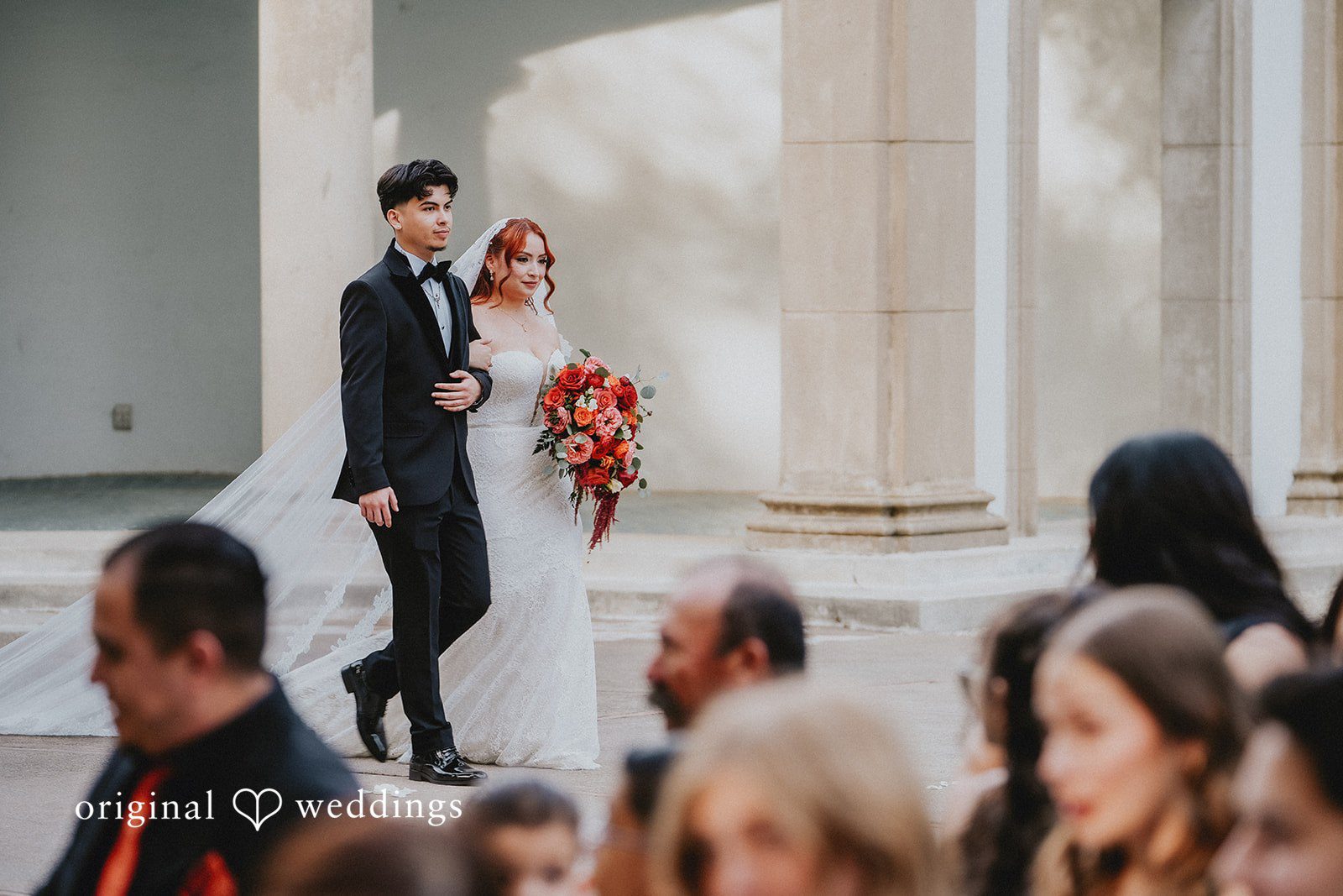 Bride walking down the aisle with someone