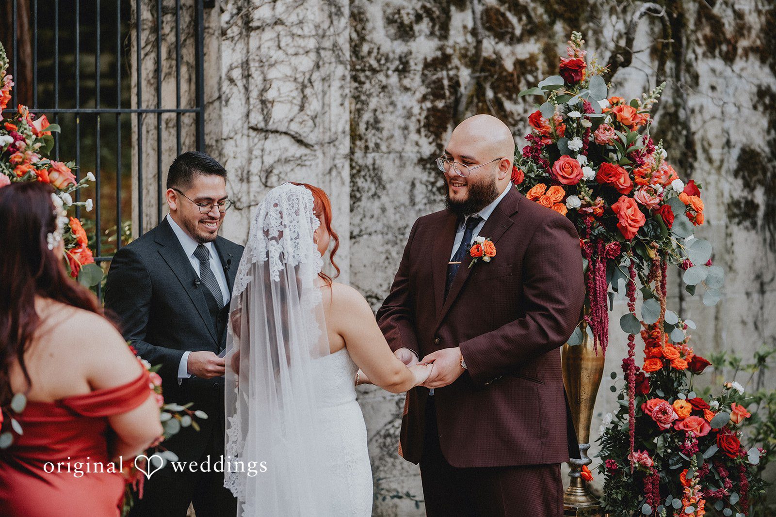 Couple exchanging vows during ceremony at Hacienda De Las Flores