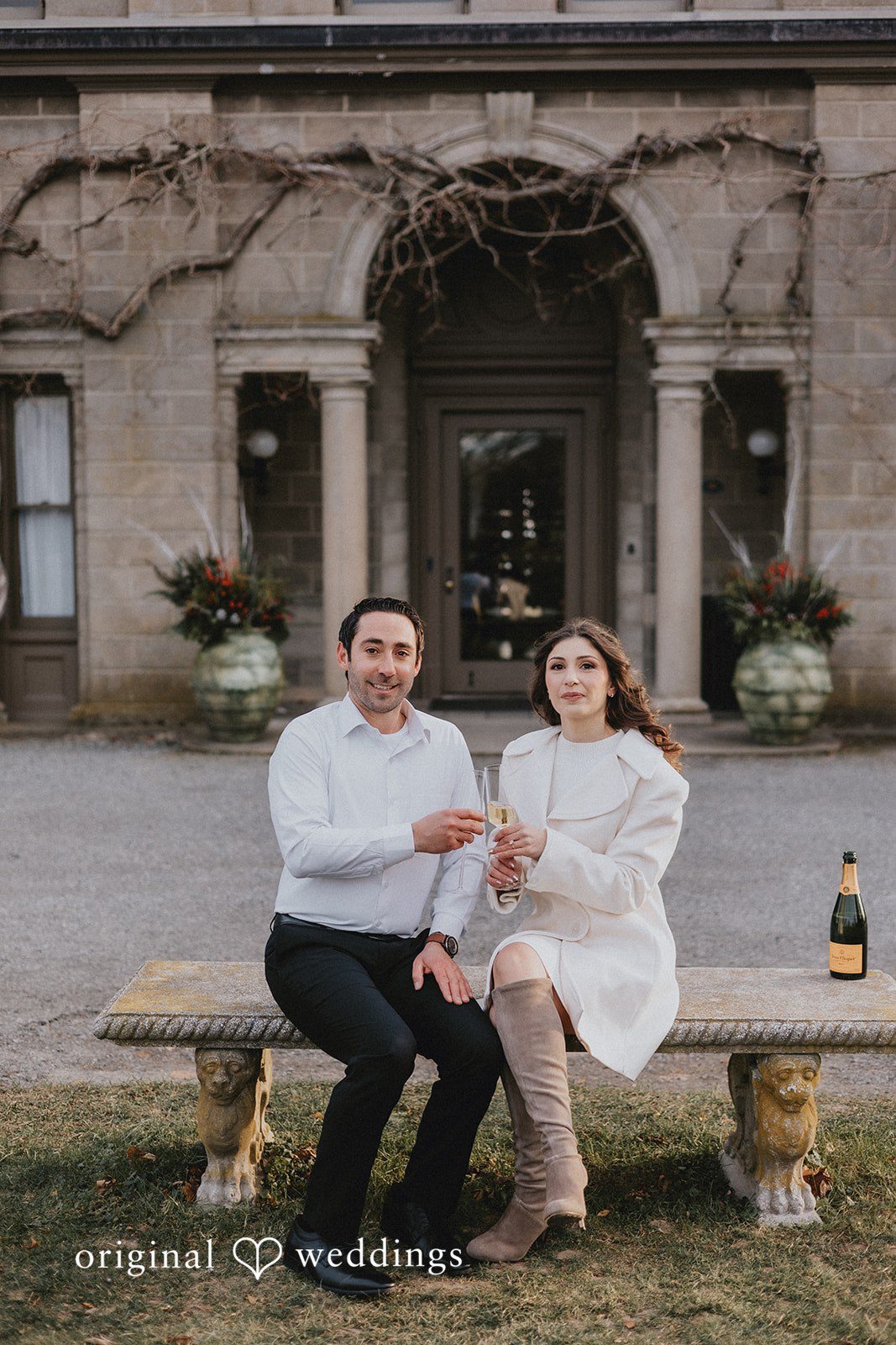 The couple makes a toast at Harkness Memorial State Park