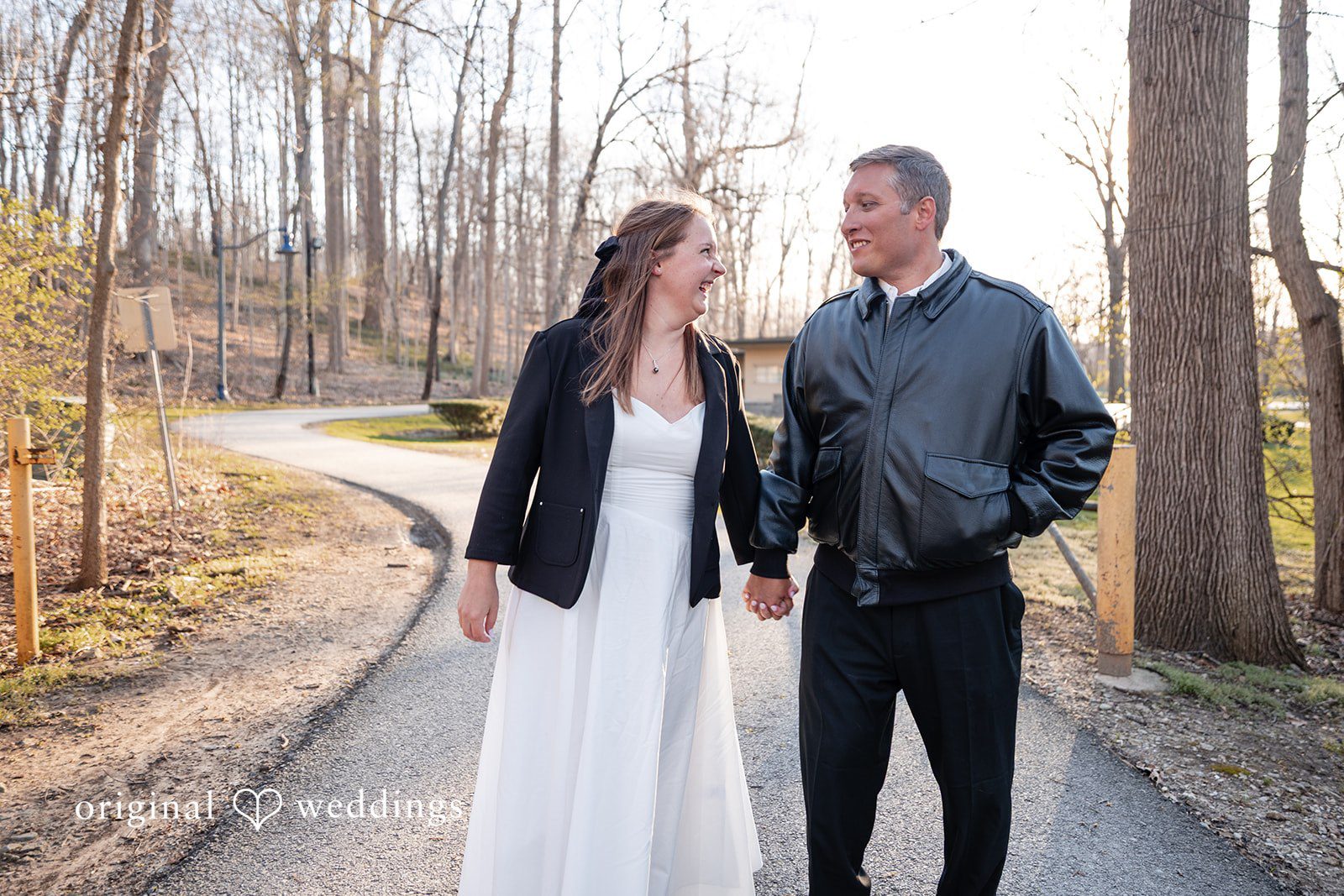 Emotional hand-holding moment captured naturally at Holcomb Gardens