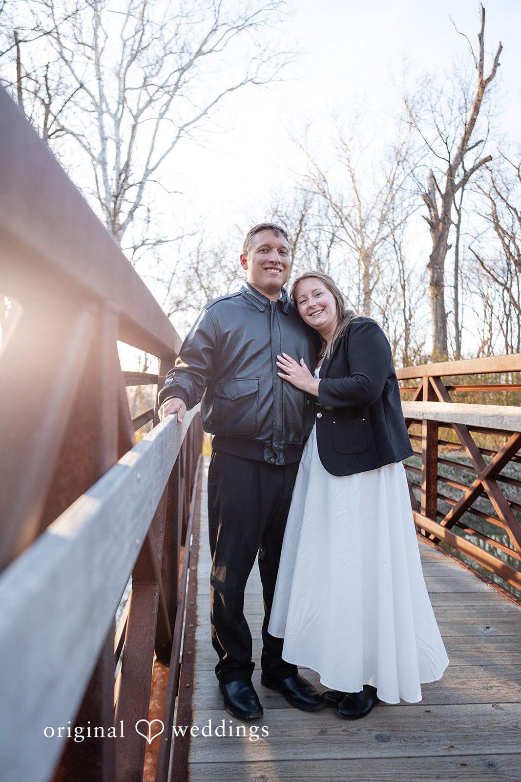 Elegant engagement photography of couple standing together at Holcomb Gardens