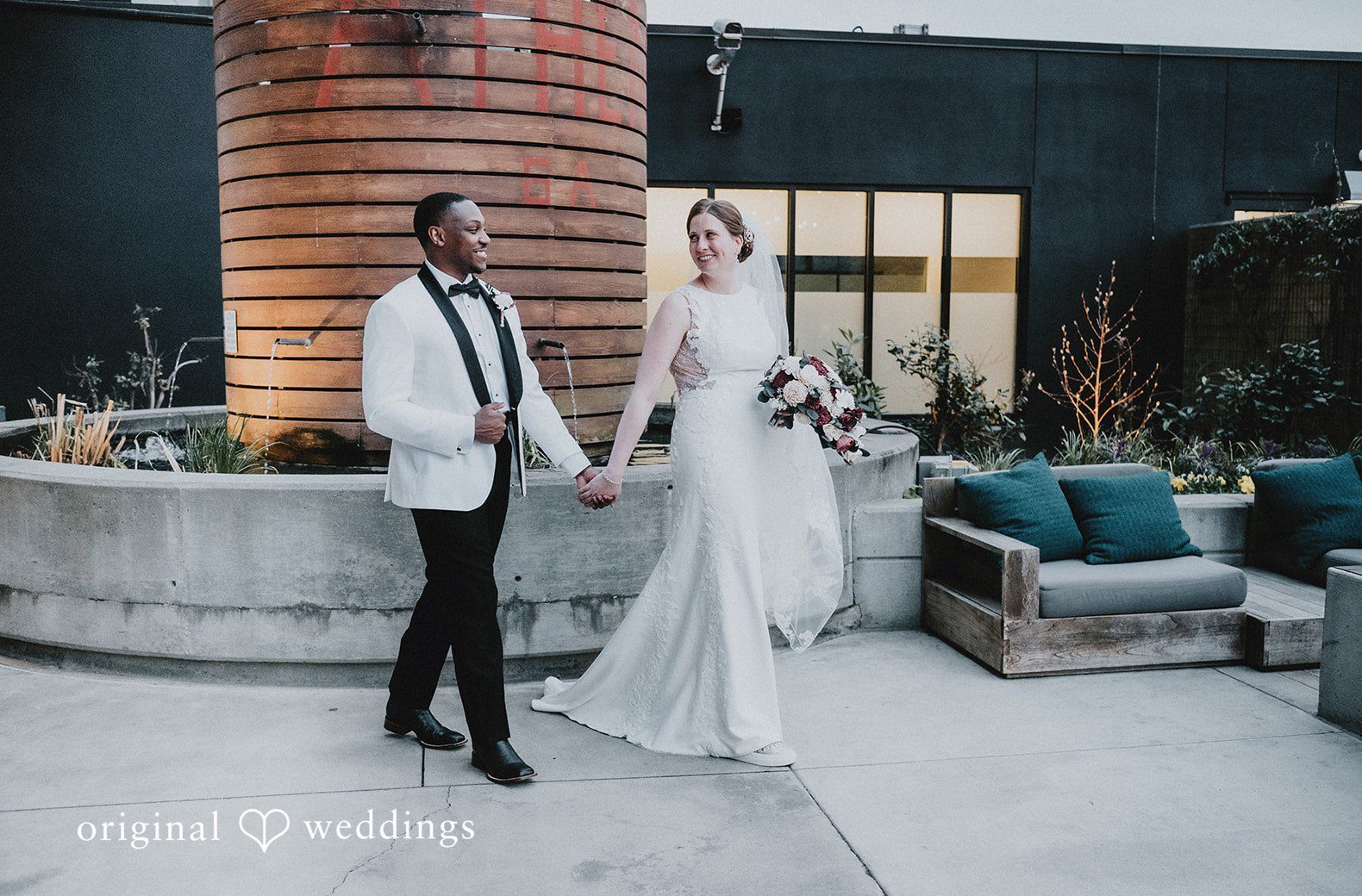 Atlanta wedding photography by original weddings capturing the beautiful couple at Hotel Indigo Athens by