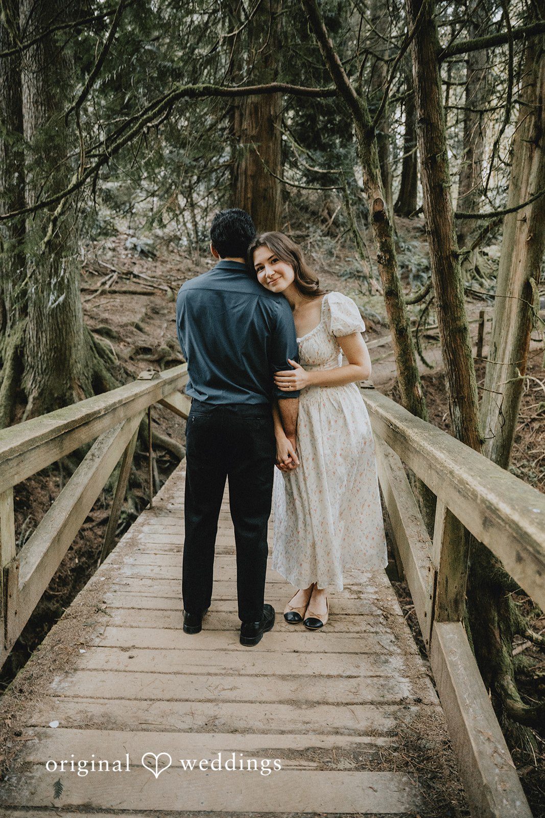 Our Portland wedding photographers captured a romantic portrait of the couple at the trails at Hoyt Arboretum