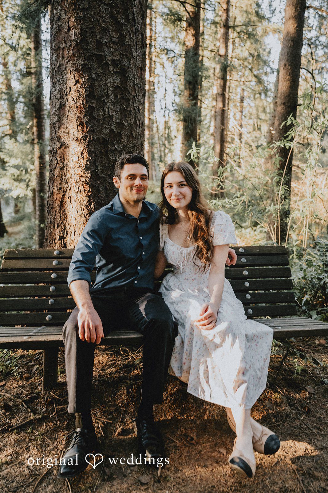 A beautiful seated portrait of the couple
