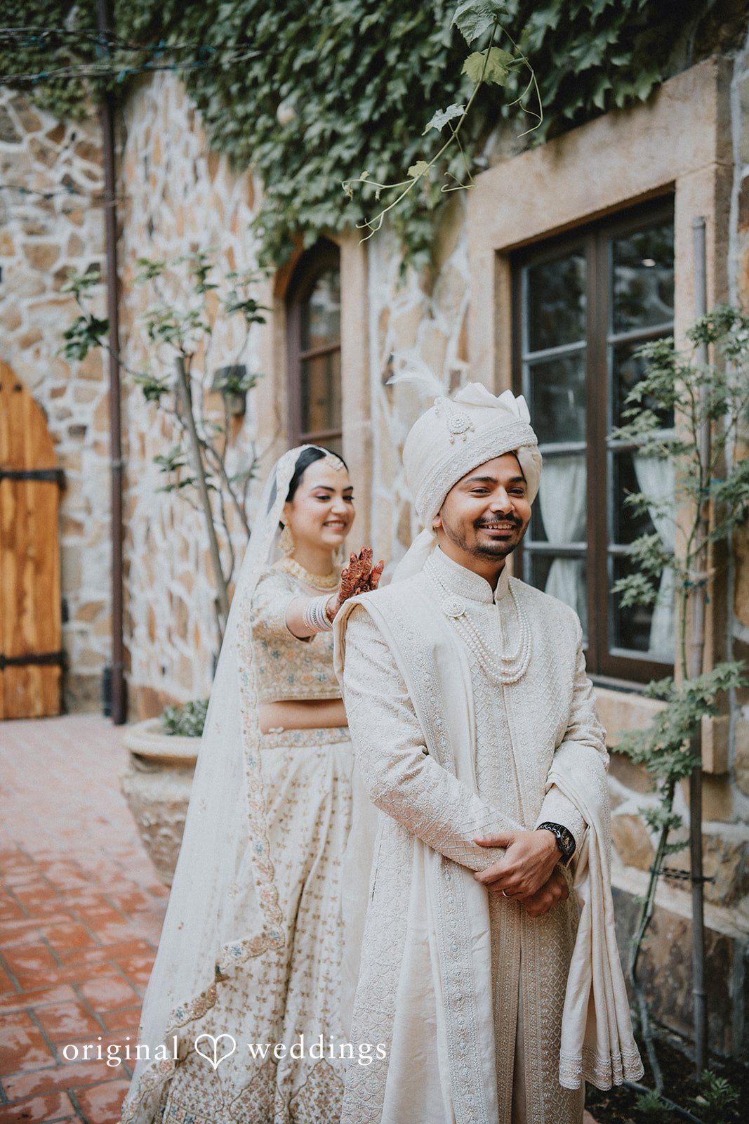 Chandrakant + Sumbul Bride touching the groom during the first look moment