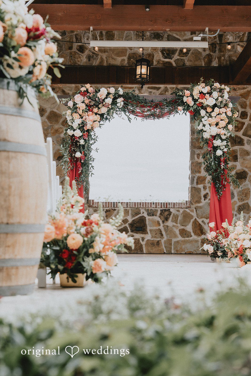 Chandrakant + Sumbul Outdoor ceremony decor details surrounded by vineyard scenery