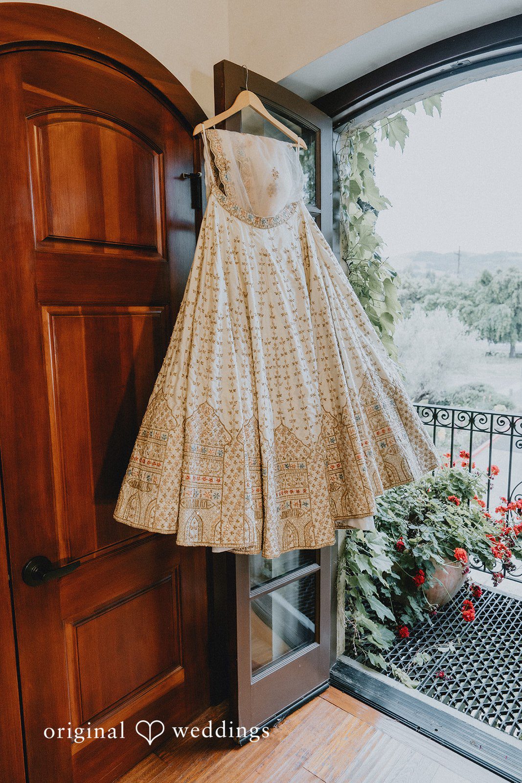 Chandrakant + Sumbul Wedding dress hanging before the ceremony begins
