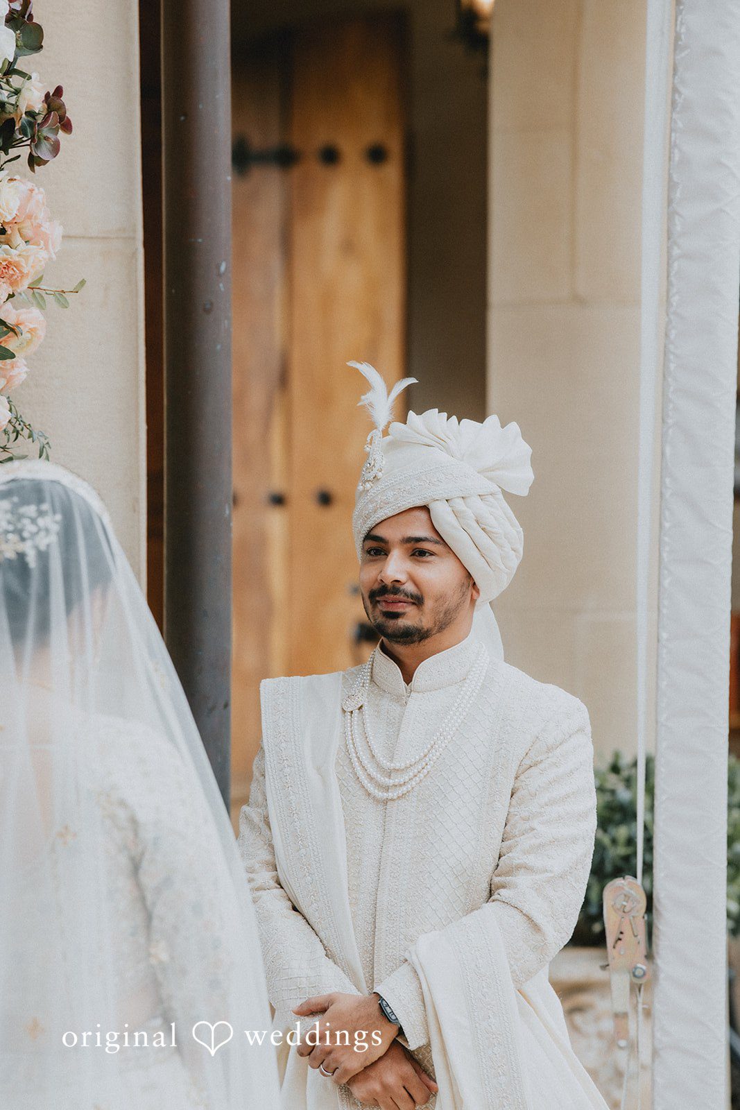 Chandrakant + Sumbul Couple sharing vows while looking at each other during the ceremony