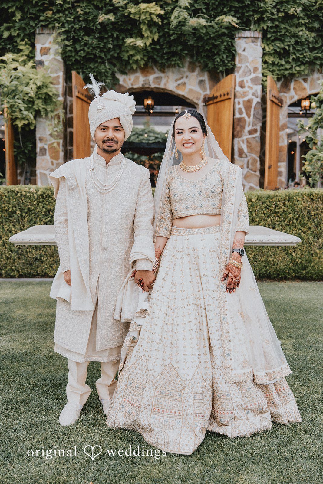 Chandrakant + Sumbul Romantic portrait of the couple among flowers and garden scenery