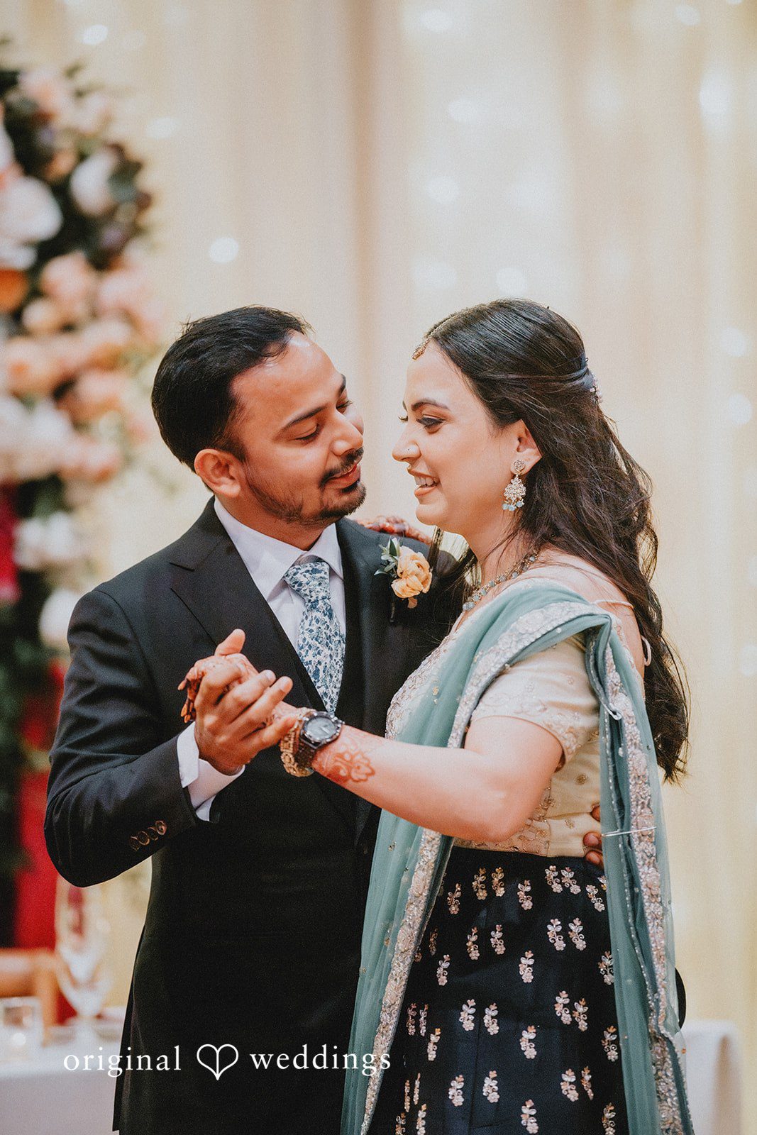 Chandrakant + Sumbul Close-up portrait of the couple dancing together at the reception